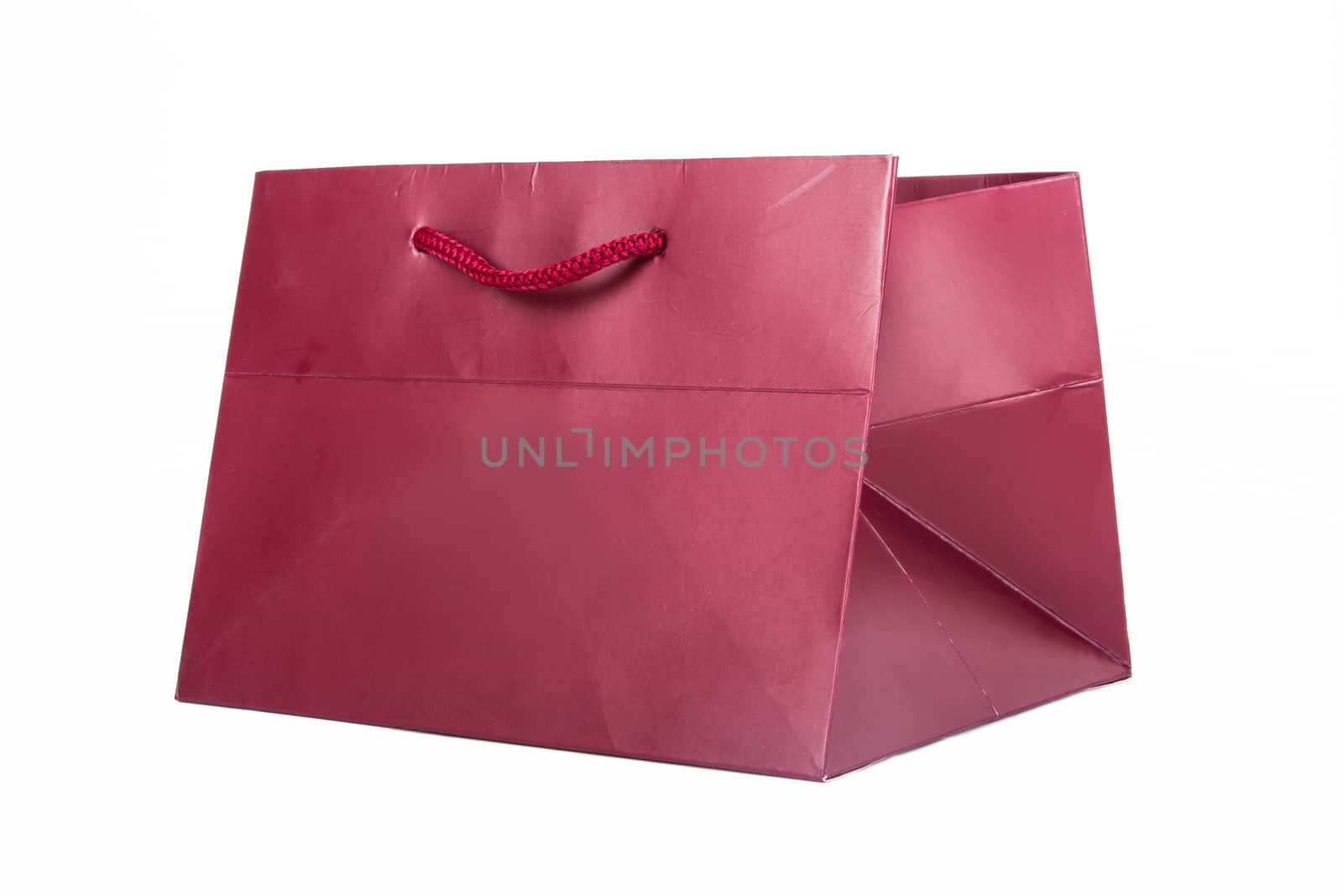 Shopping bag with handle, isolated on white background.
