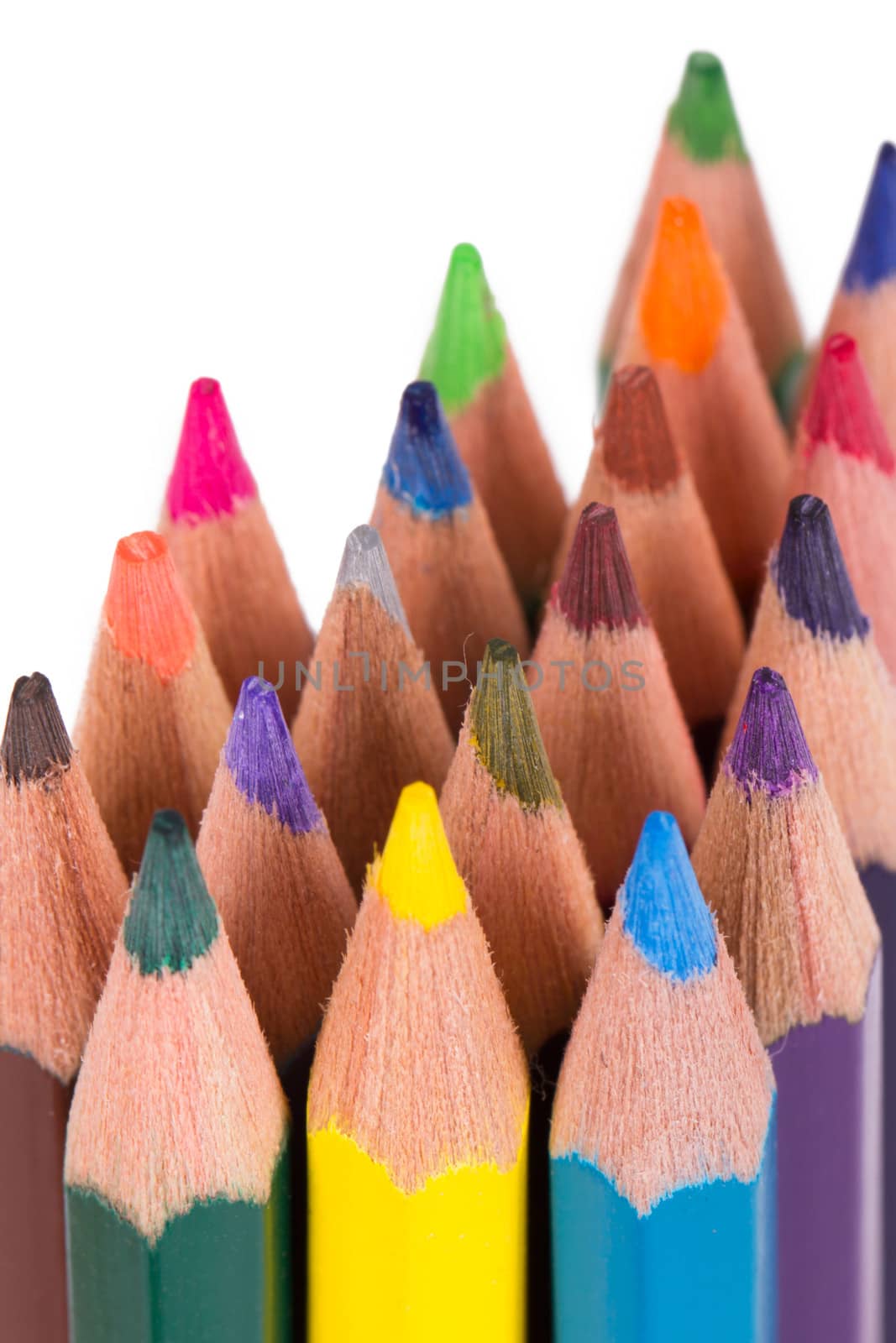 Close up view of colorful pencils, isolated on white background.
