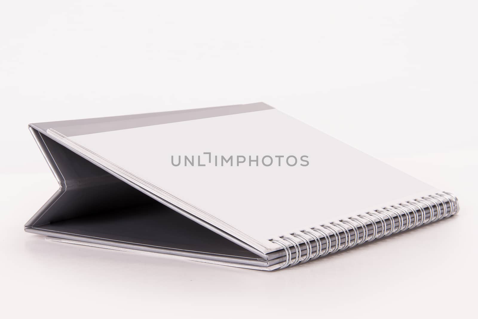 Blank desk calendar, isolated on white background.
