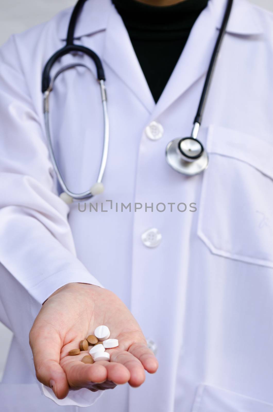 Doctor giving you medical pill by jengit