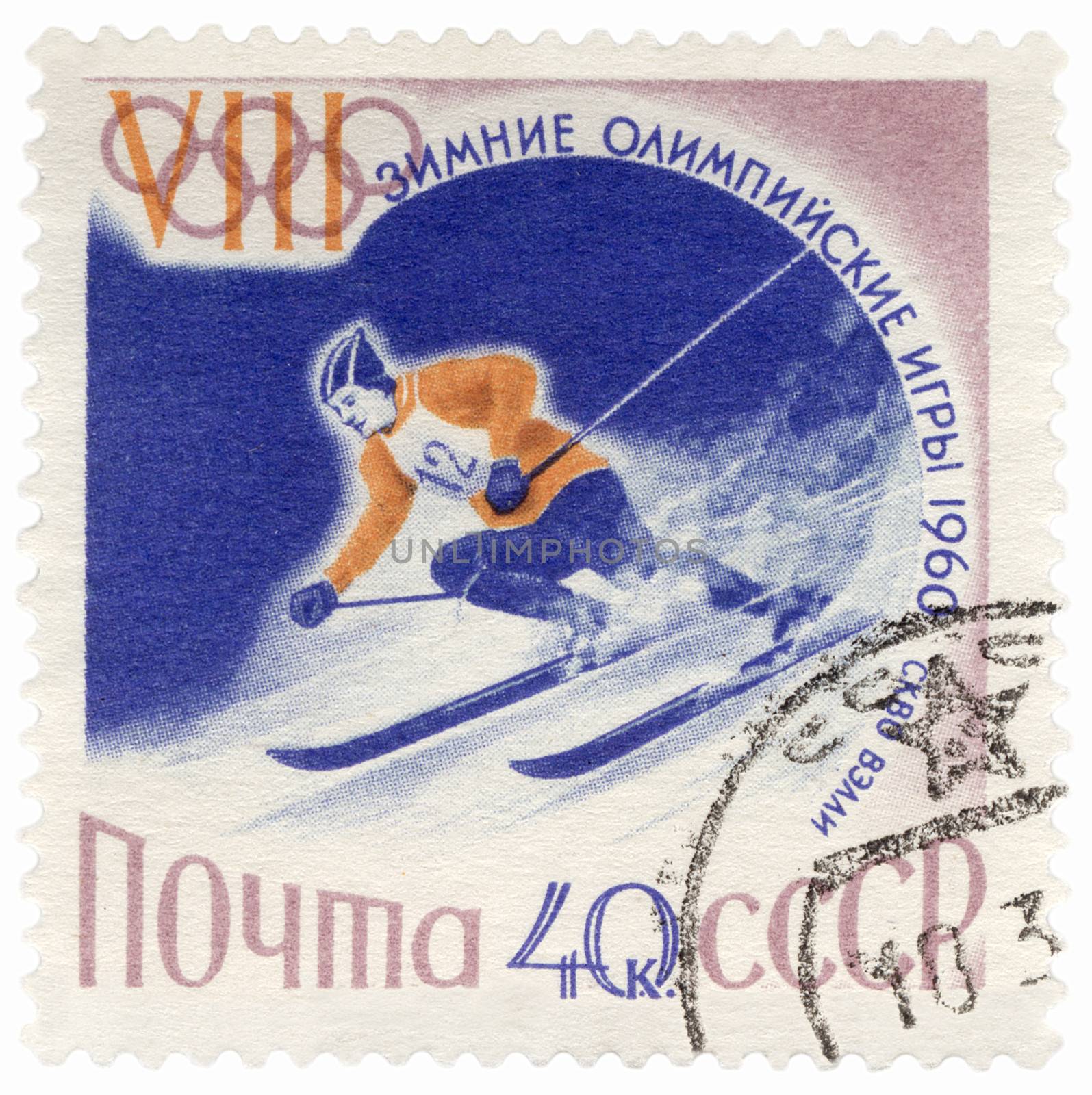 USSR - CIRCA 1960: A post stamp printed in the USSR shows skier on a steep mountain slope, dedicated to the Winter Olympic Games in Squaw Valley, series, circa 1960