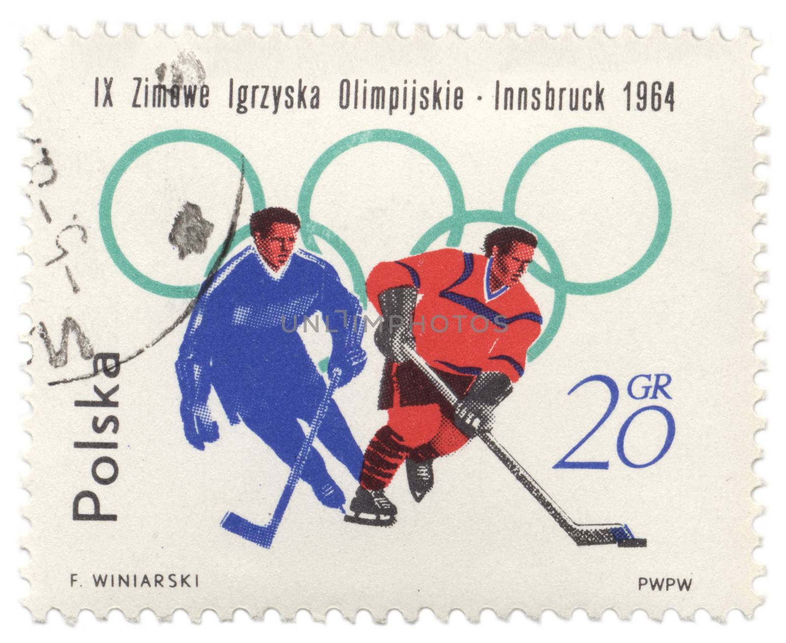 Two hockey players on post stamp by wander