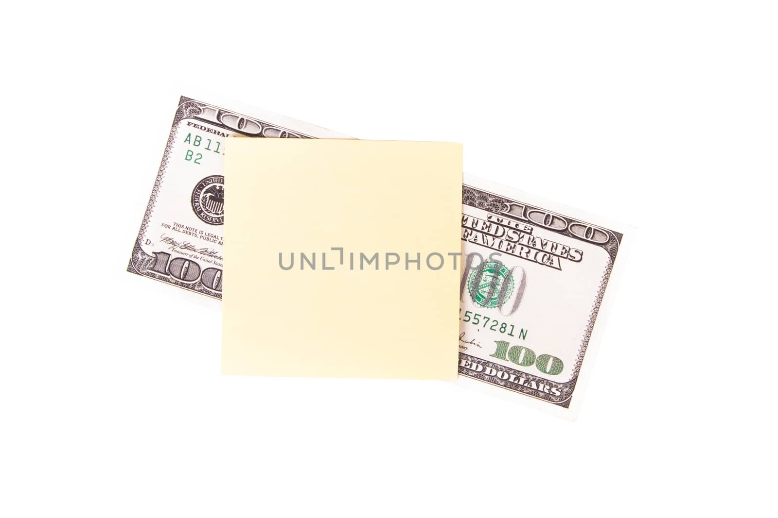 One hundred dollar bill with yellow, blank, empty sticky post it note for your message, isolated on white background.