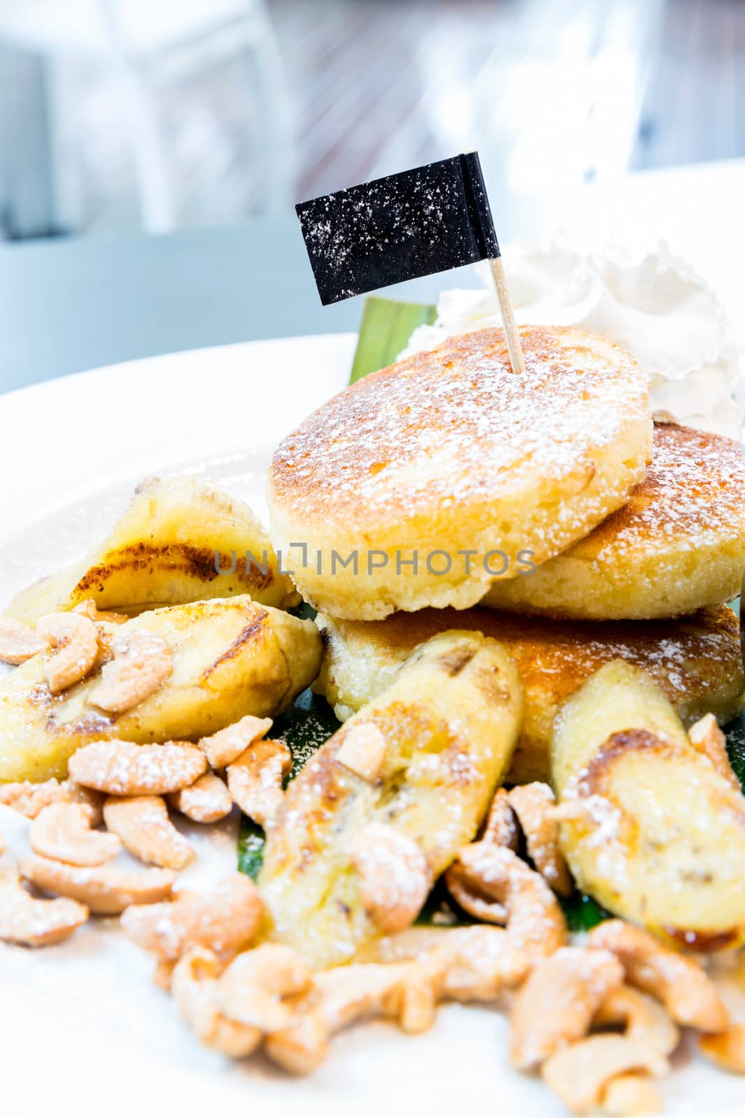 Coconut pancake with honey syrup (Selective Focus)