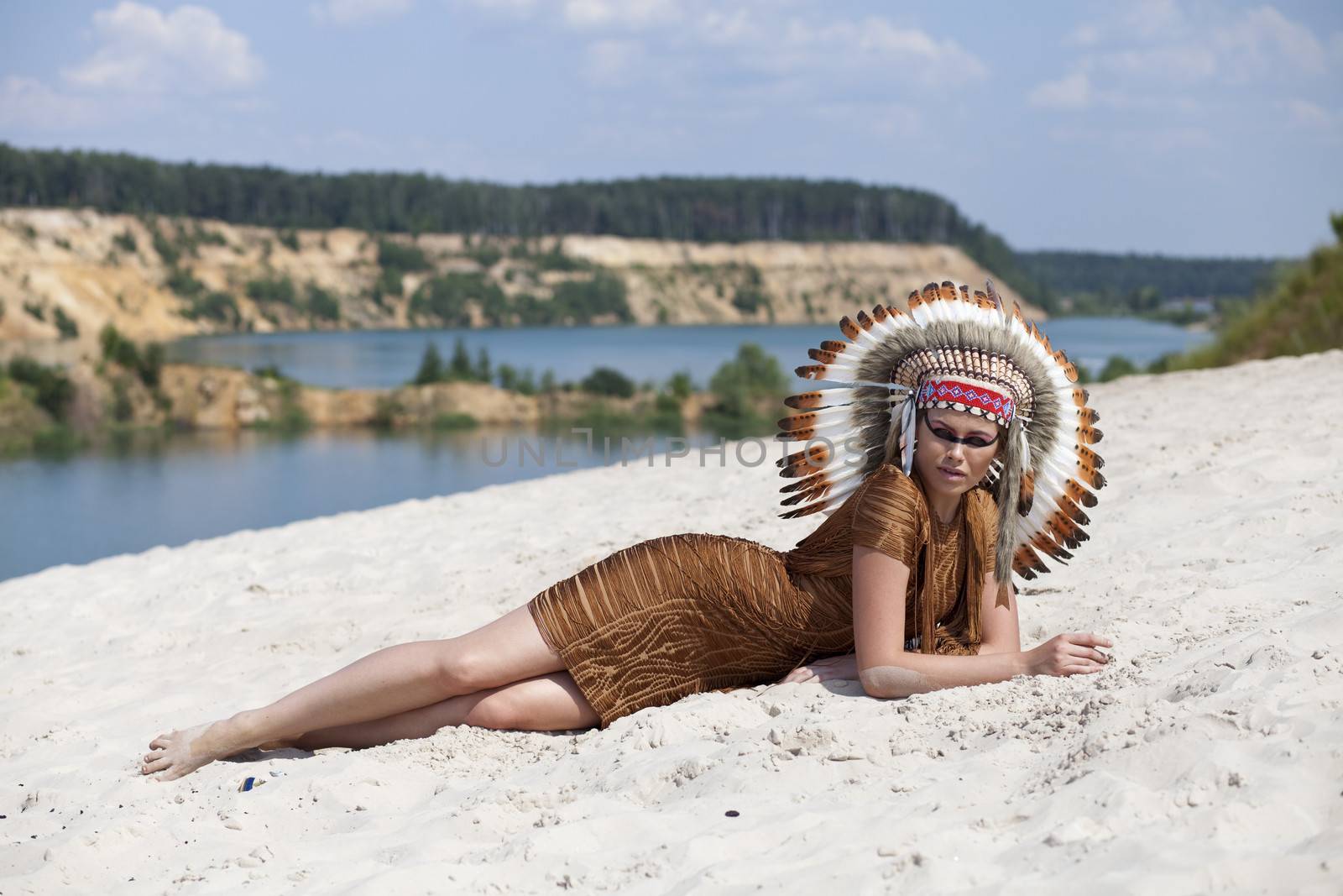 Young woman in costume of American Indian