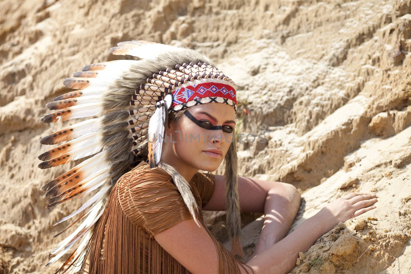 Young woman in costume of American Indian
