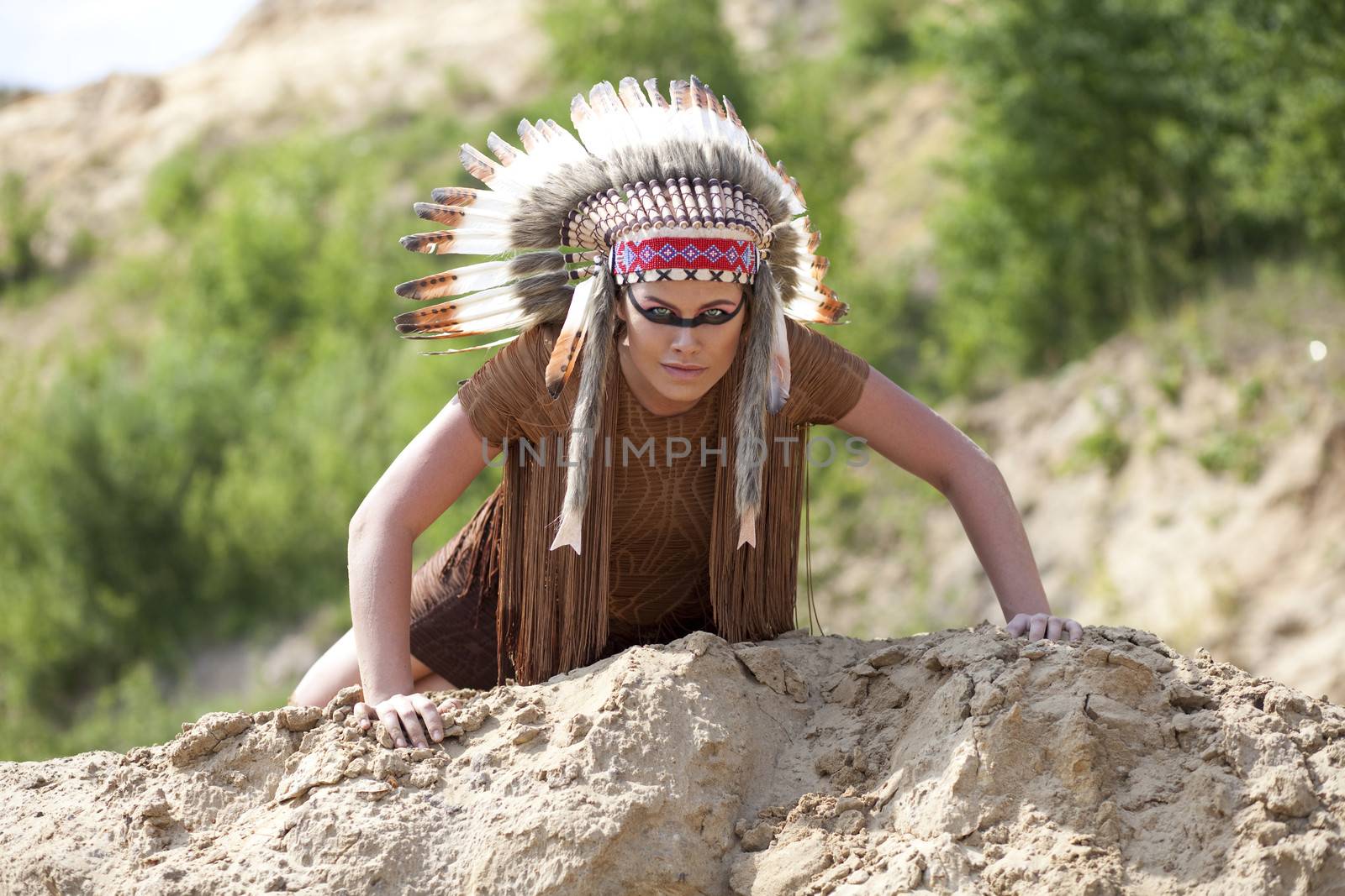 Young woman in costume of American Indian
