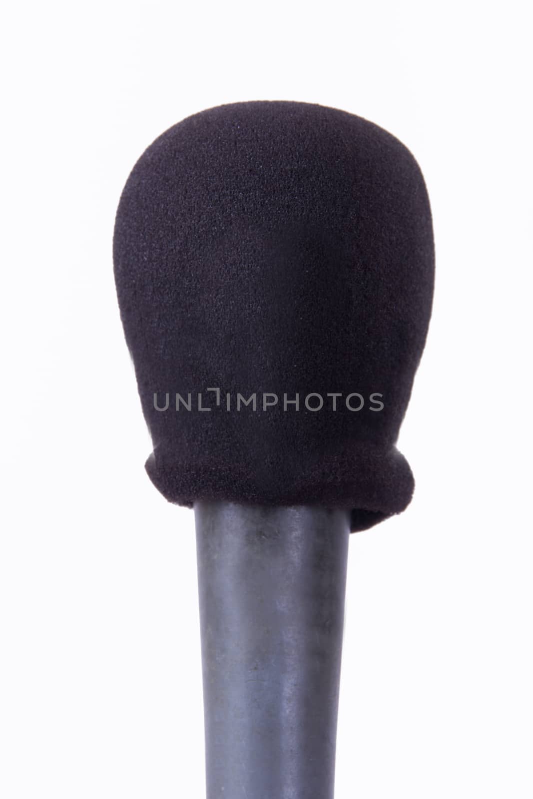 Black and dirty microphone, isolated on white background.