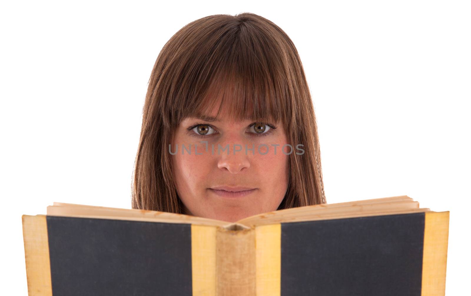 Woman reading an old used book, isolated on white