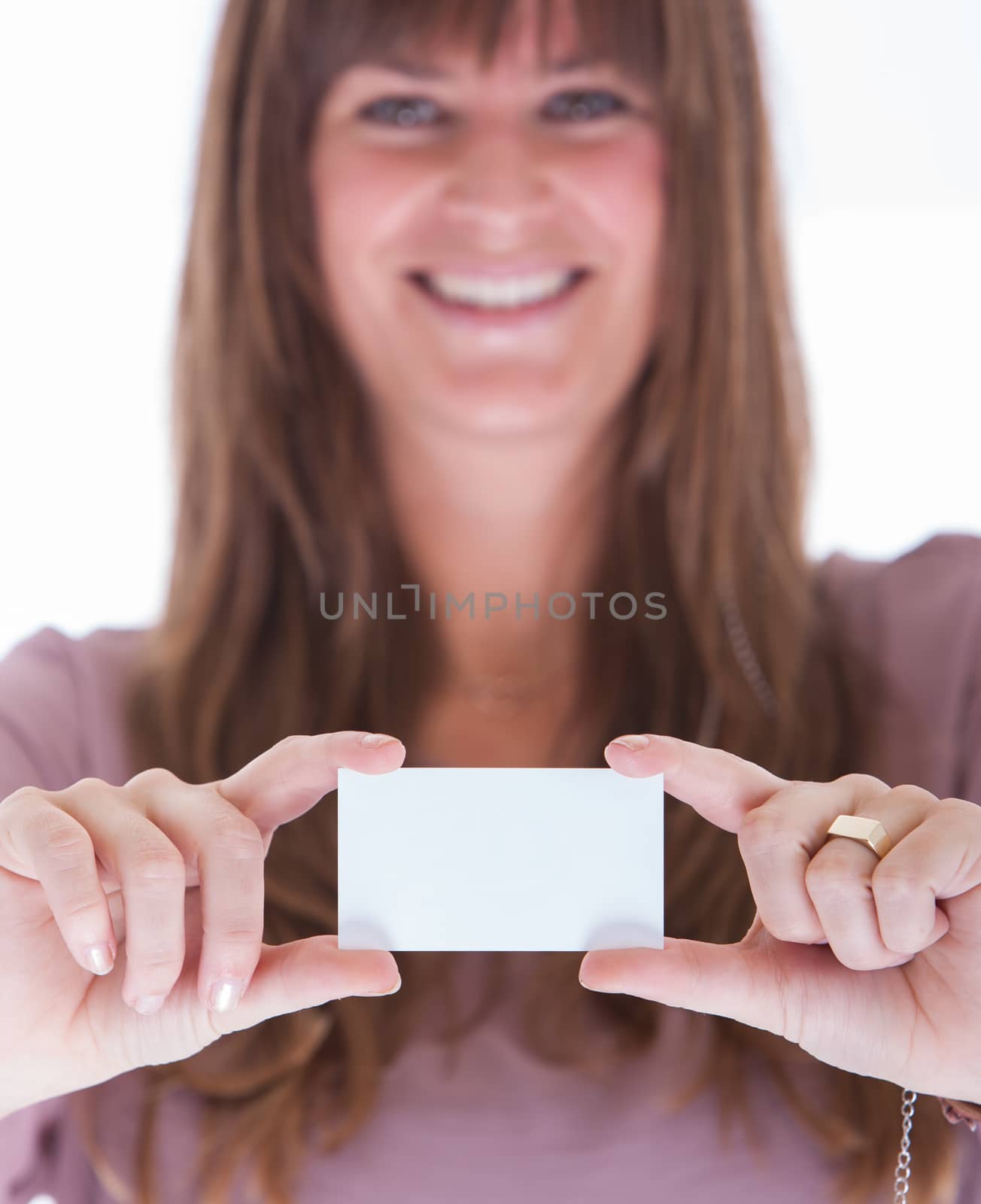 Woman showing a blank business card, close-up