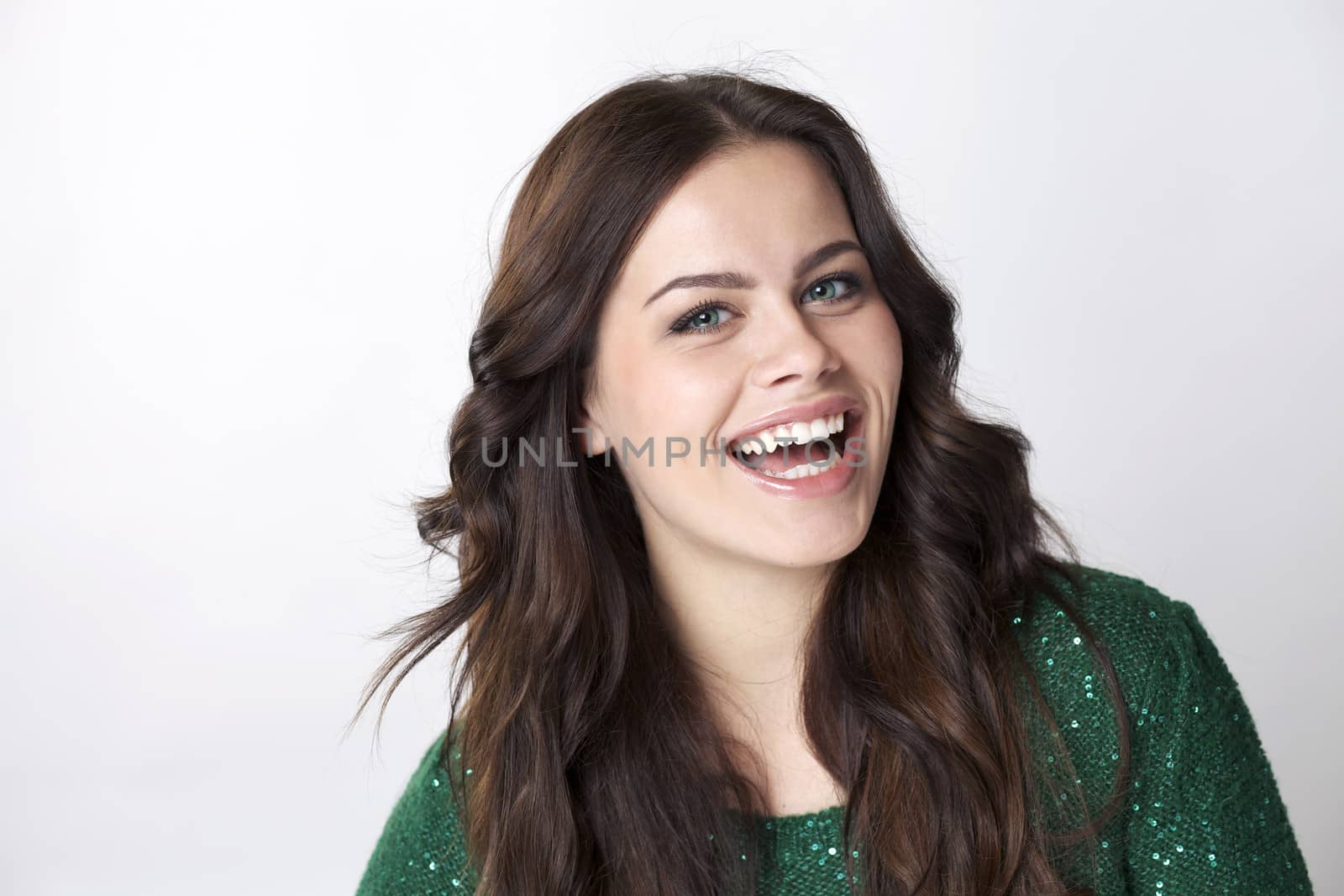 Closeup portrait of a happy young woman smiling