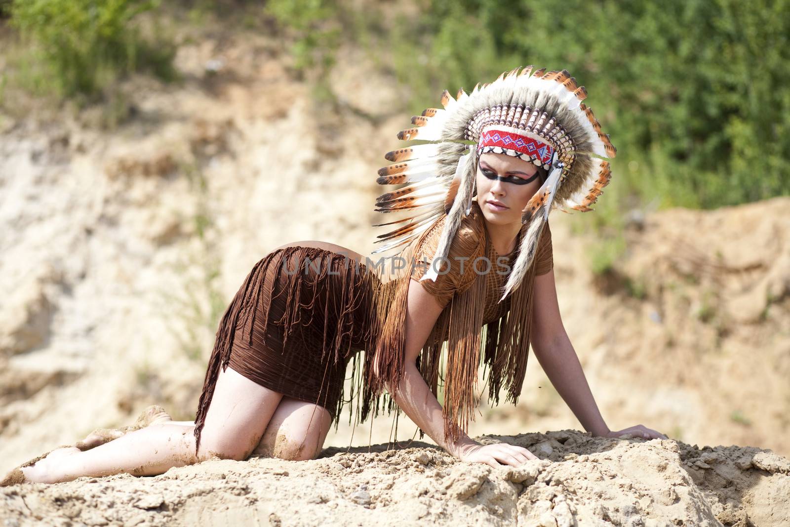 Young woman in costume of American Indian