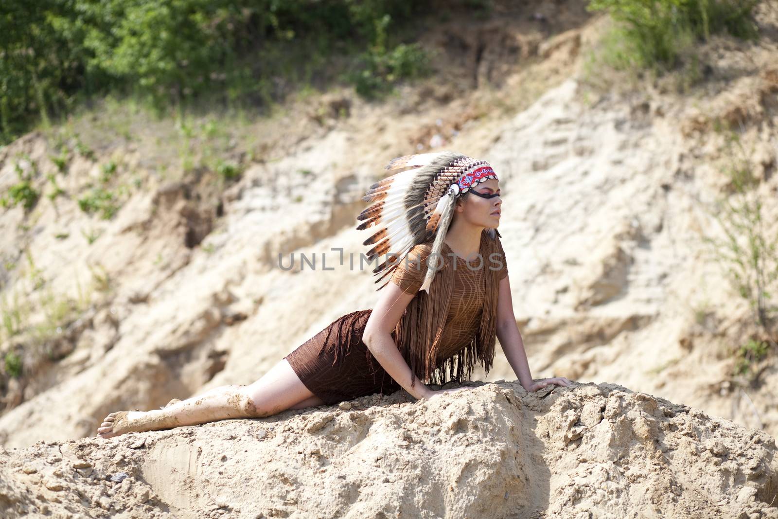 Young woman in costume of American Indian