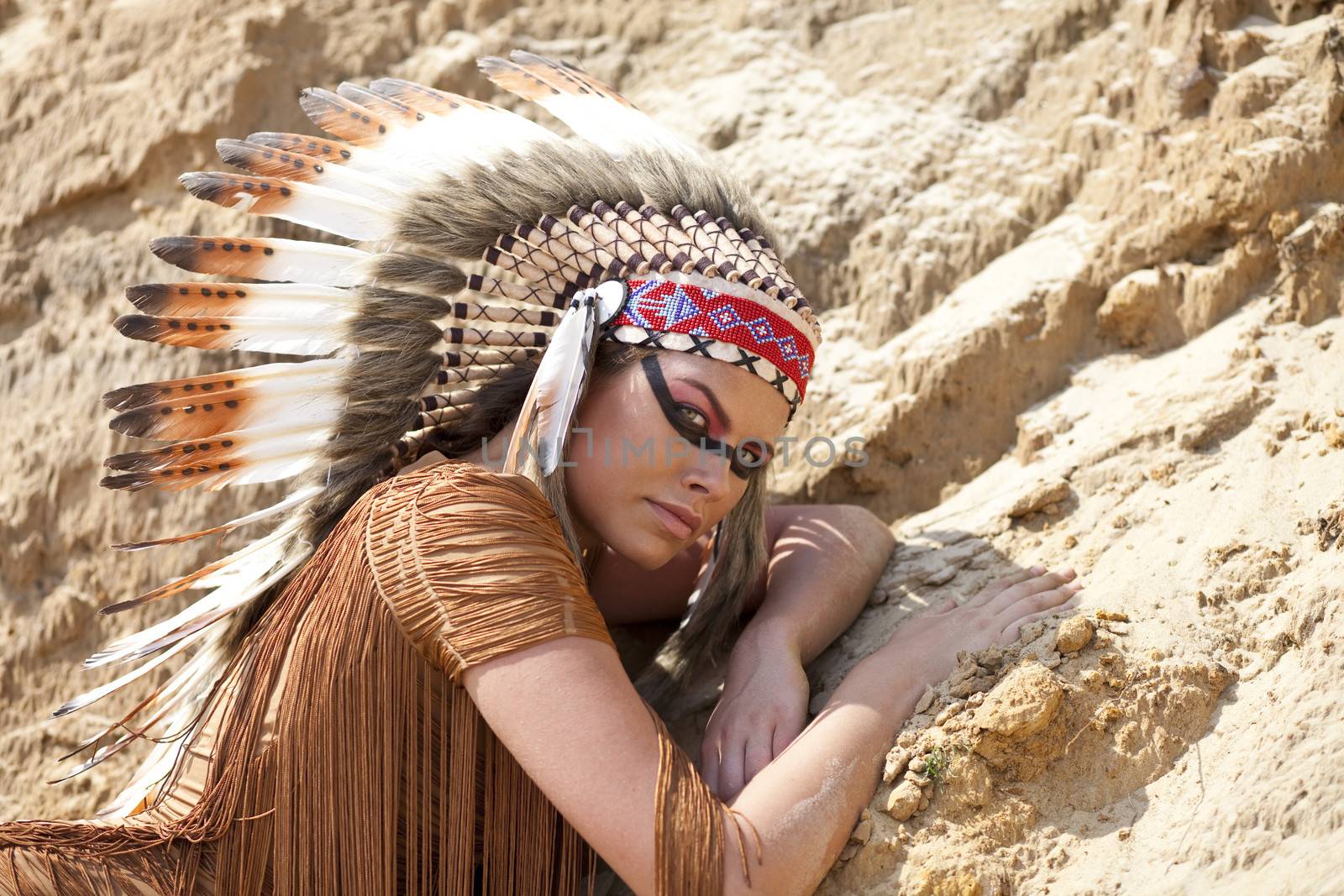 Young woman in costume of American Indian