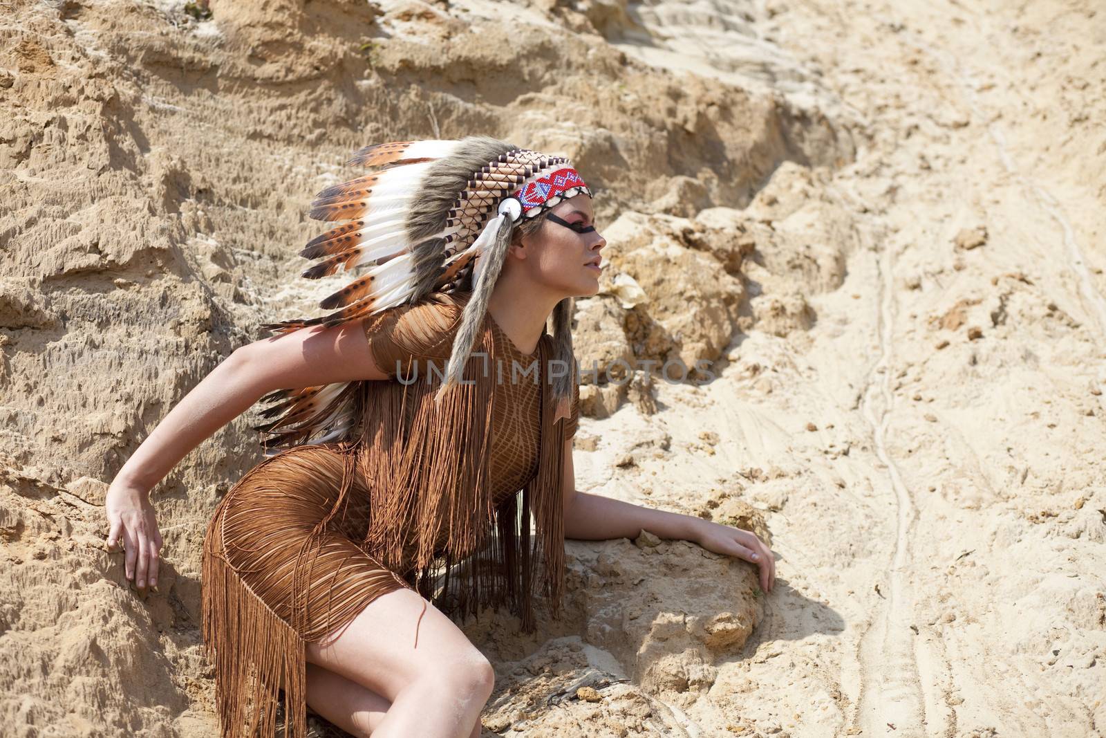 Young woman in costume of American Indian