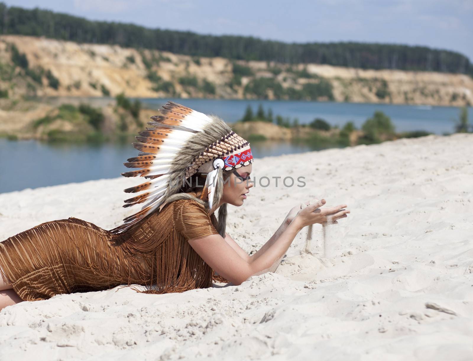 Young woman in costume of American Indian