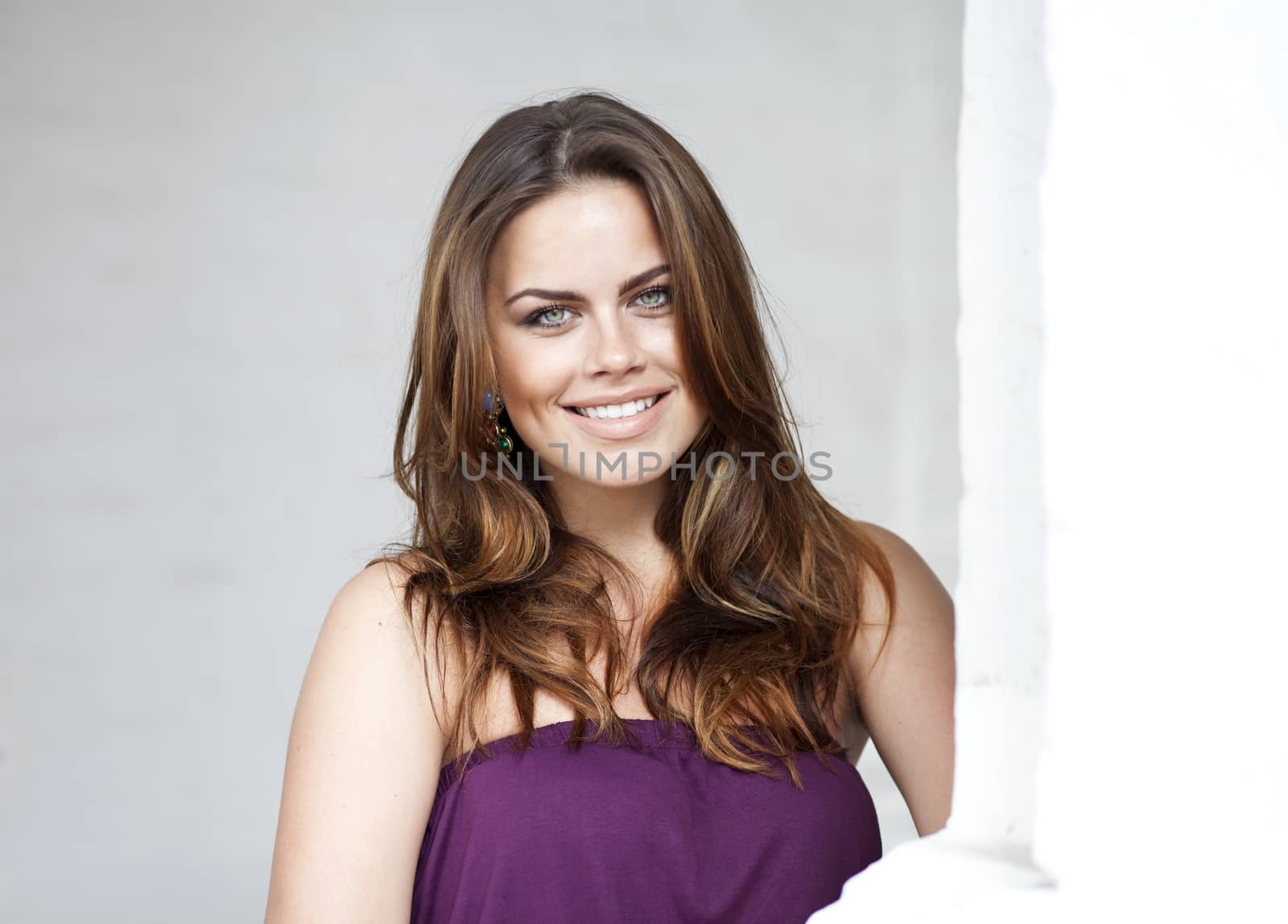 Closeup portrait of a happy young woman