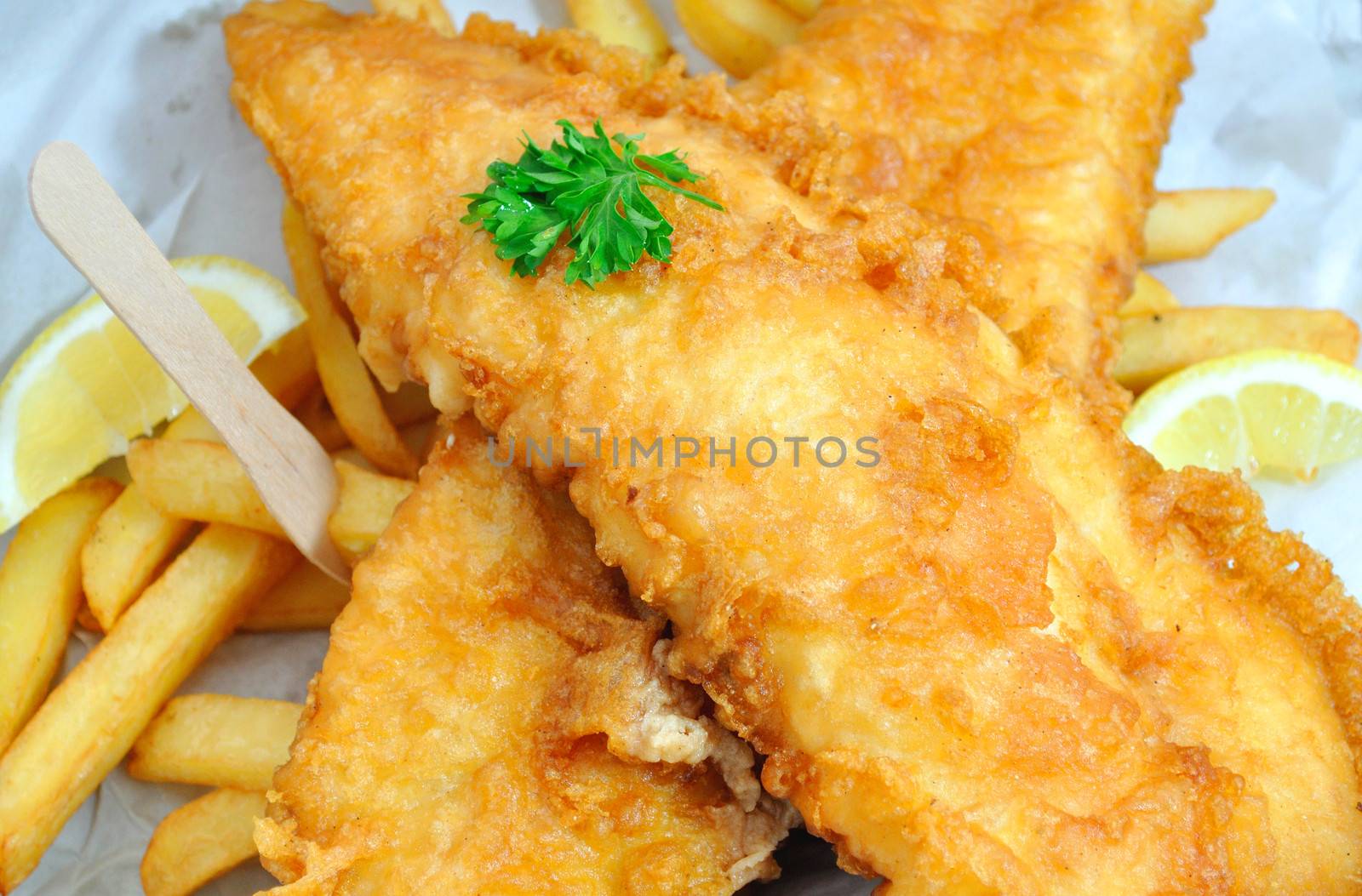 Traditional english fish and chips takeaway meal