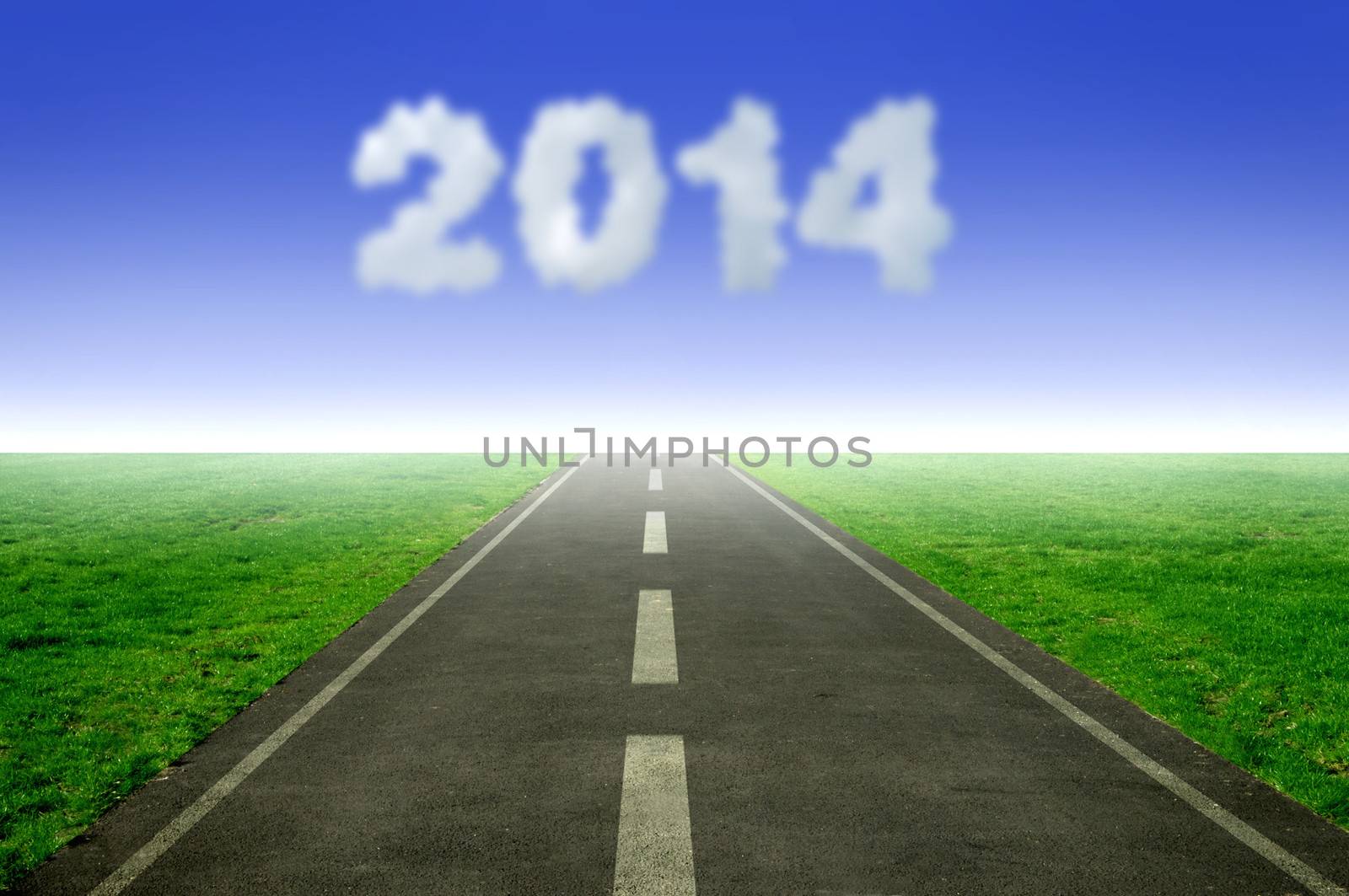 Open road leading towards 2014 in cloud form 