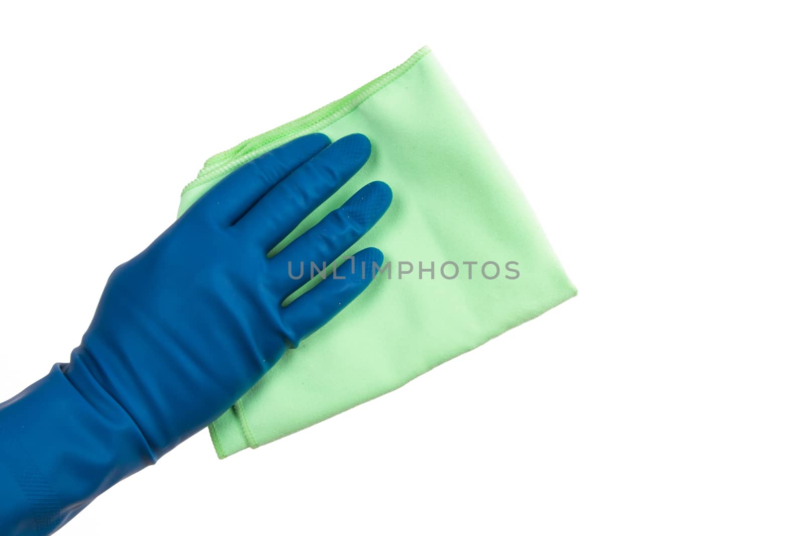 Hand in glove holding green rag, isolated on white background.