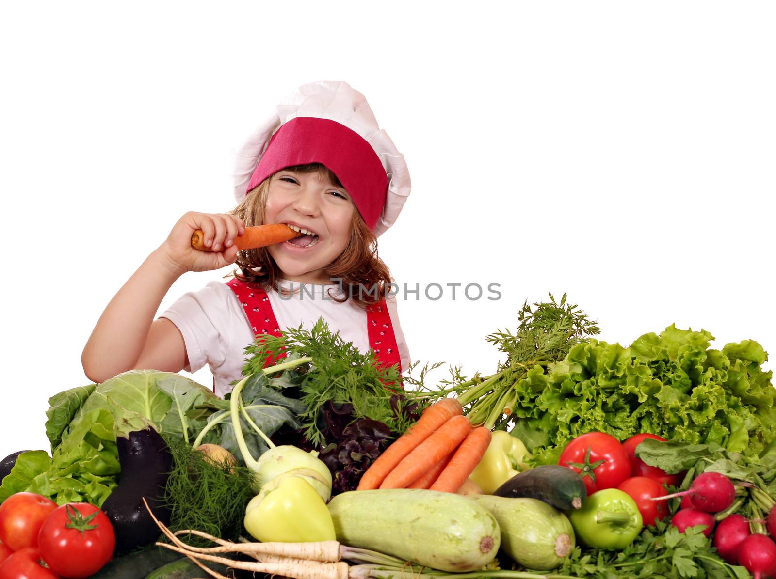 little girl cook eat carrot