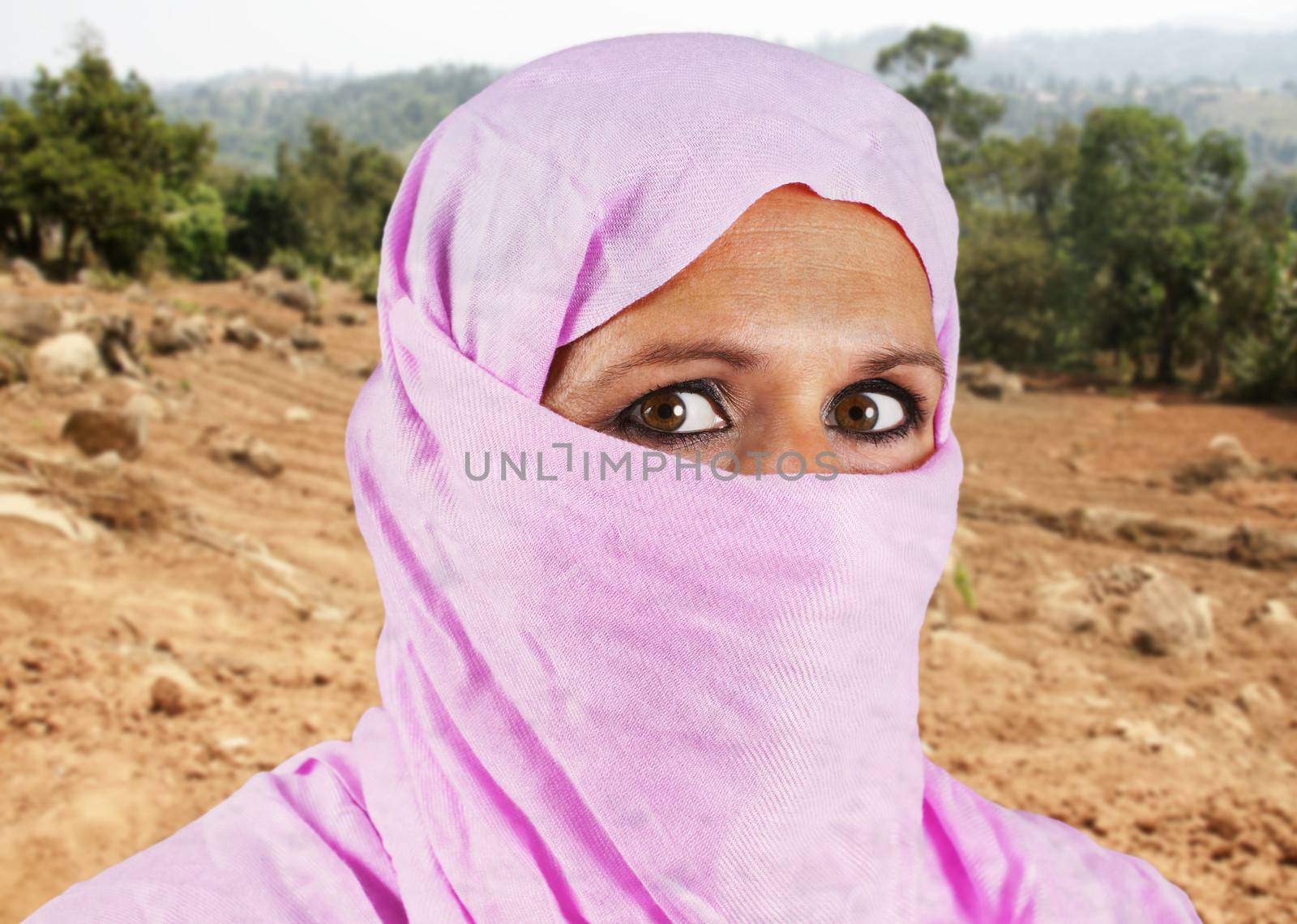 Middle aged muslim woman in pink by Mirage3