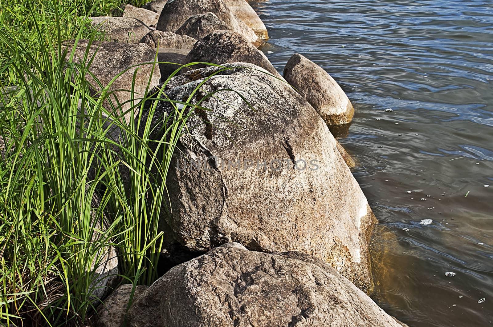 Boulders at the lake bank by wander