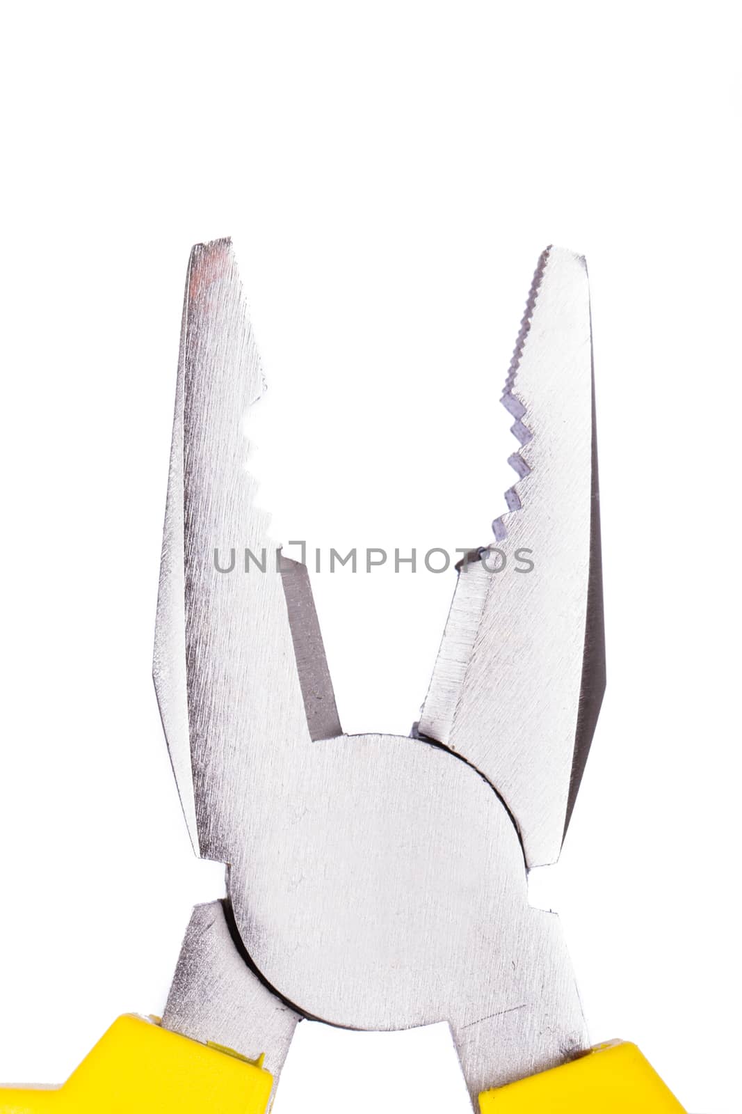 Close up view of yellow pliers, isolated on white background.