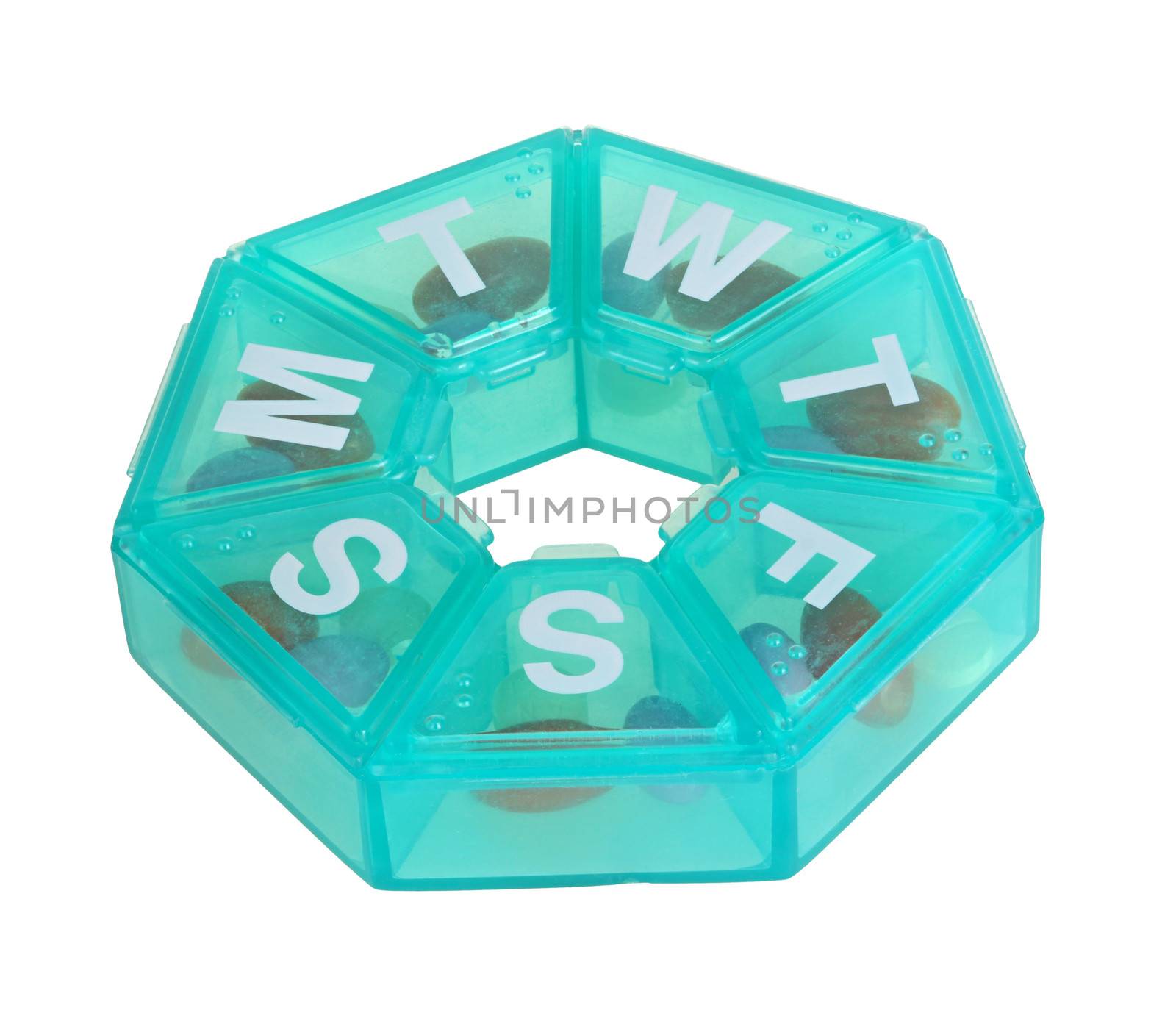 Heptagonal dispenser for a week of pills isolated against a white background