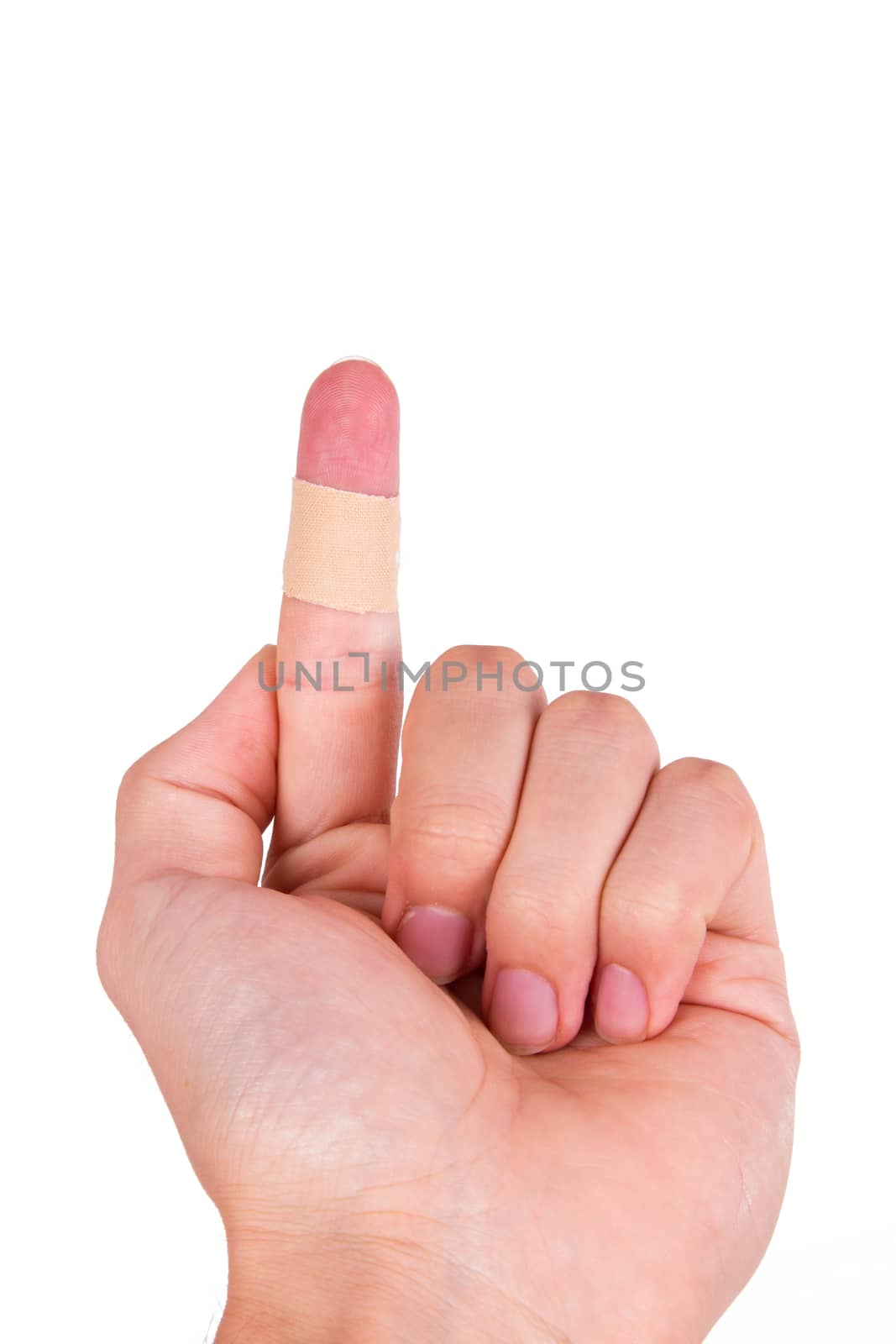Adhesive bandage, plaster on index finger, isolated on white background.