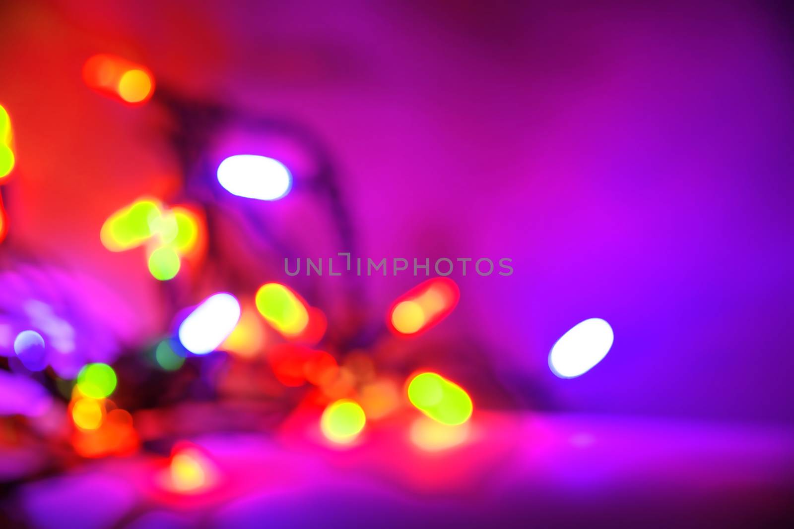 Fun out of focus Christmas light background with great colors.
