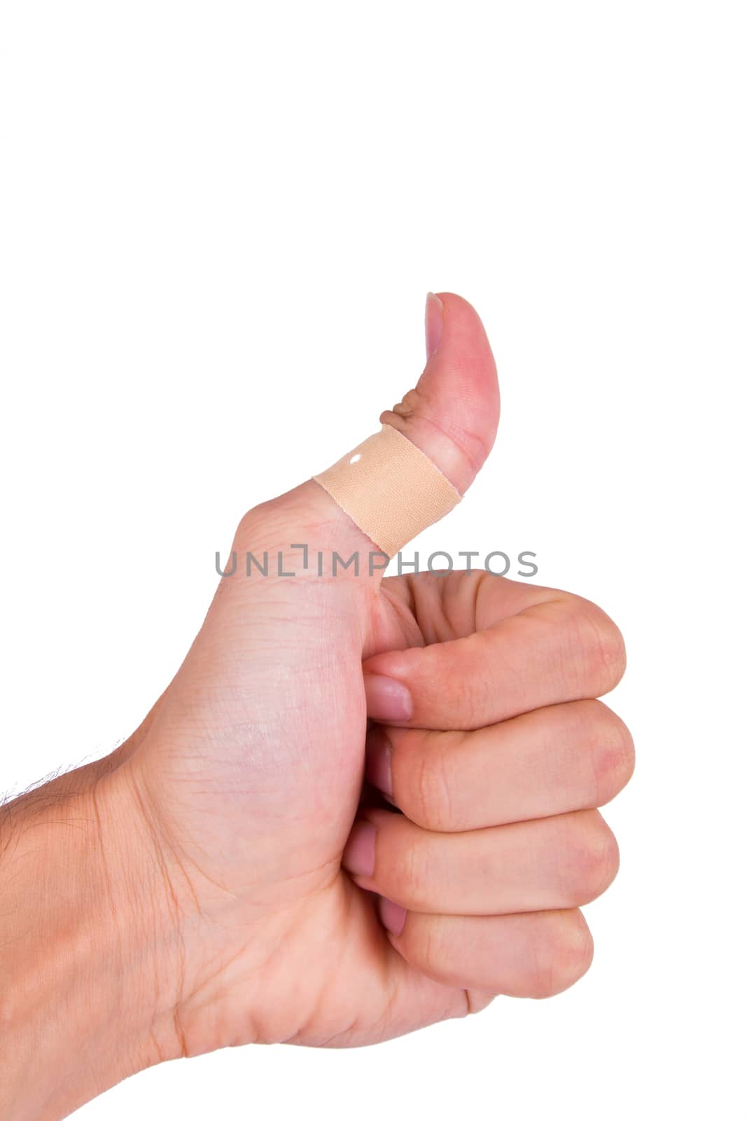 Adhesive bandage, plaster on thumb, isolated on white background.