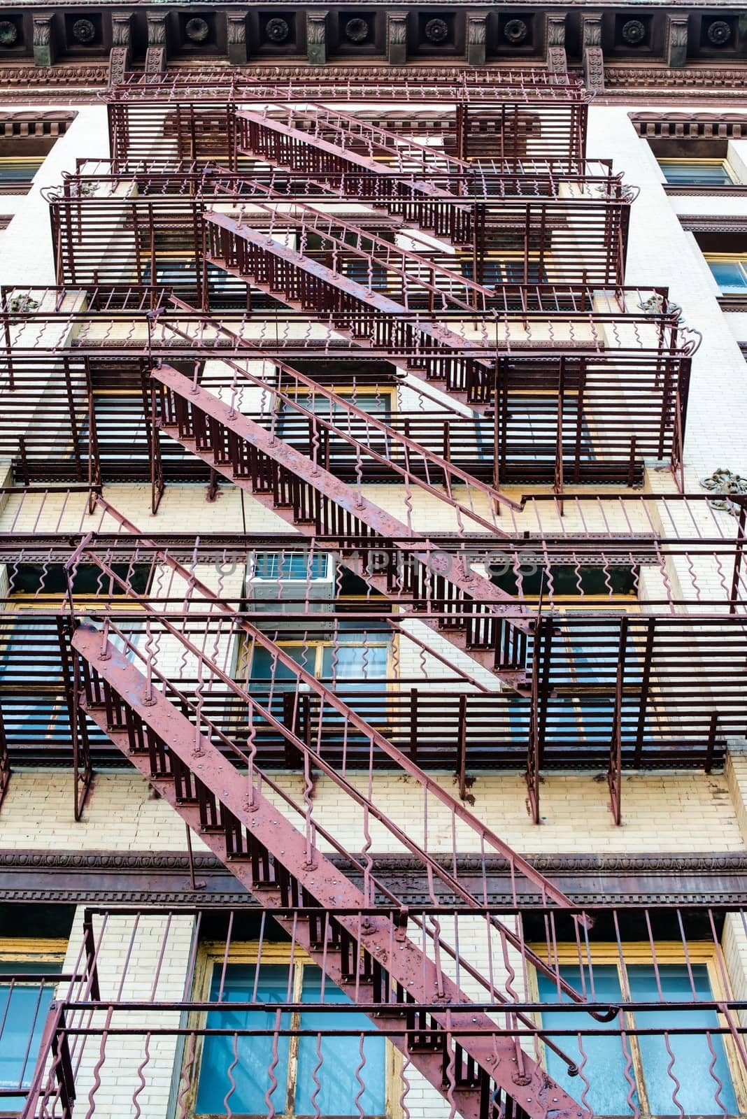 fire ladder at old beautiful houses downtown in New York