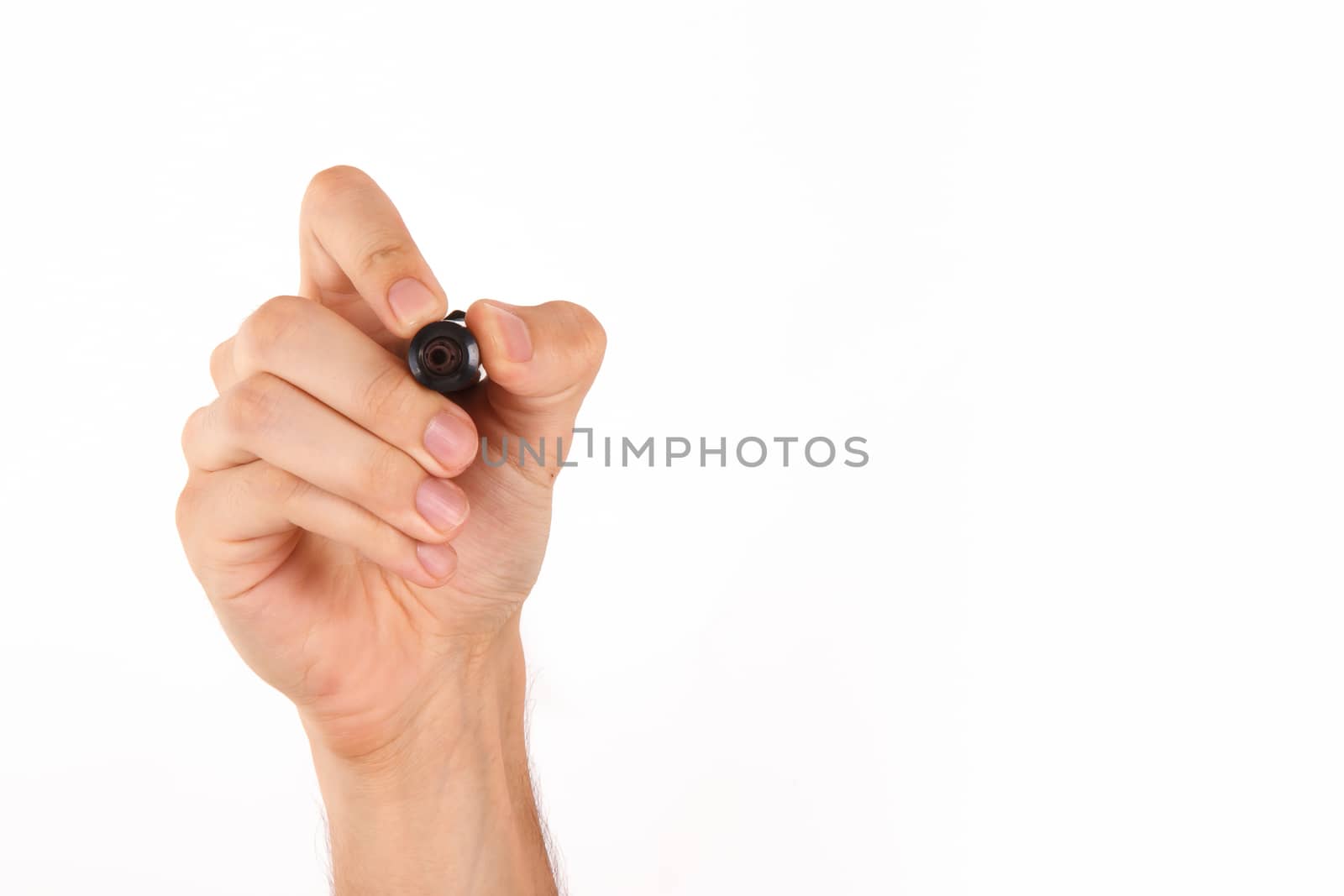 Human hand holding marker and writing or drawing, isolated on white background with space for text.