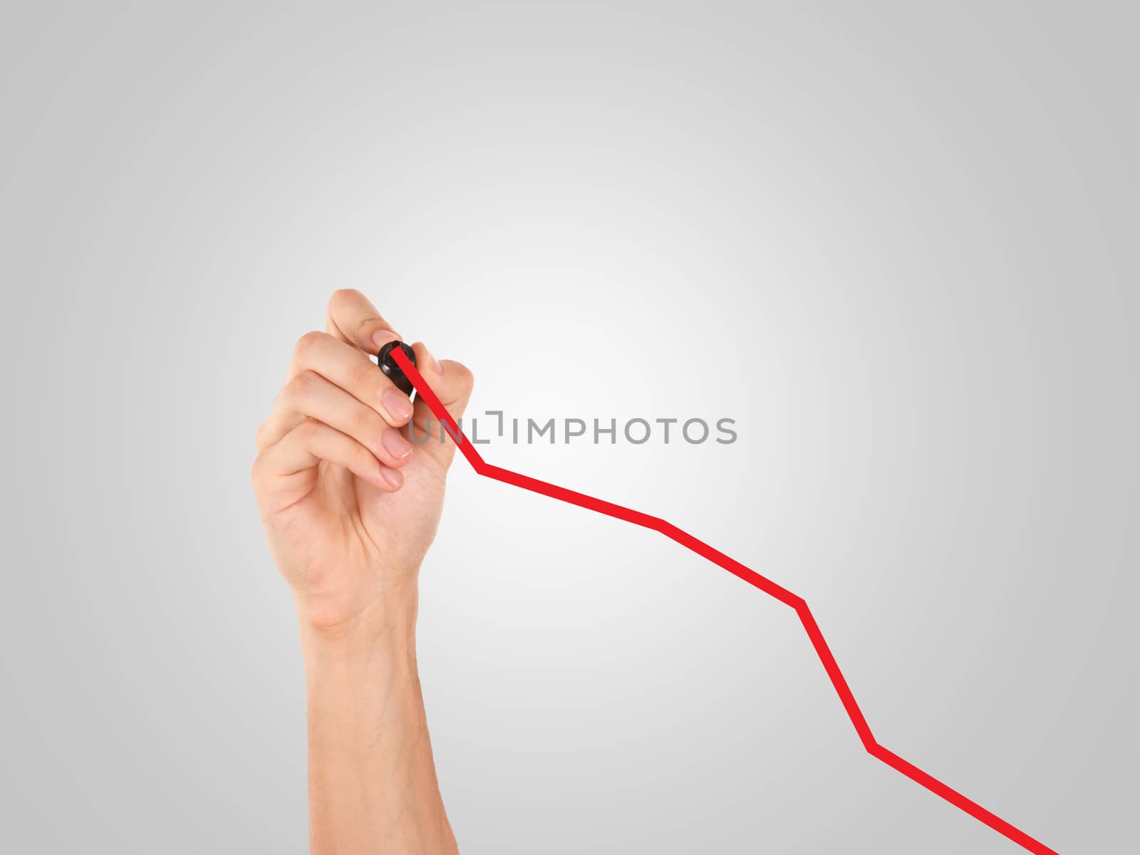 Hand drawing, sketching graph chart with red marker.
