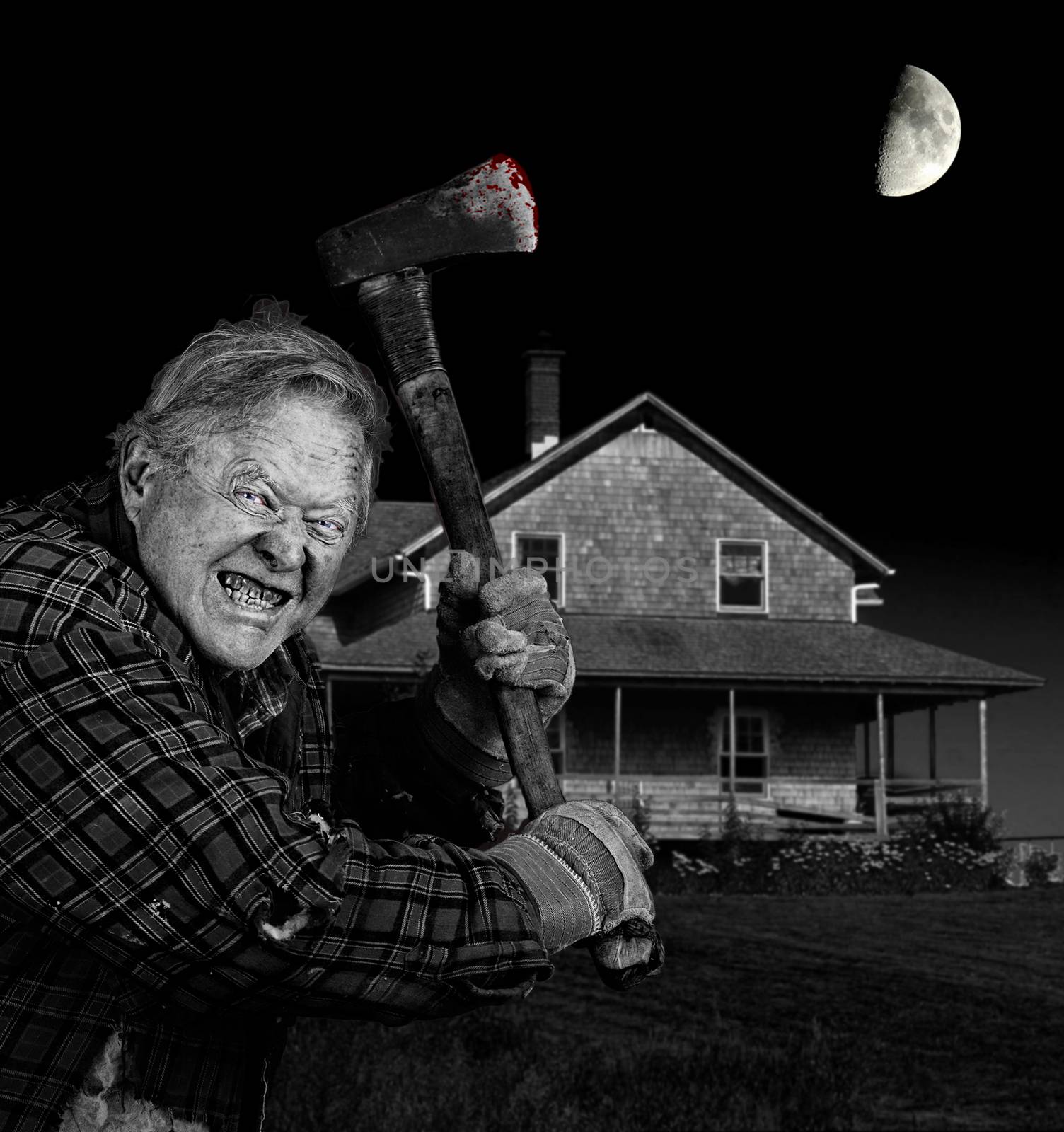 Crazy old man with axe in front of old cedar wood shingle farm house, black and white 