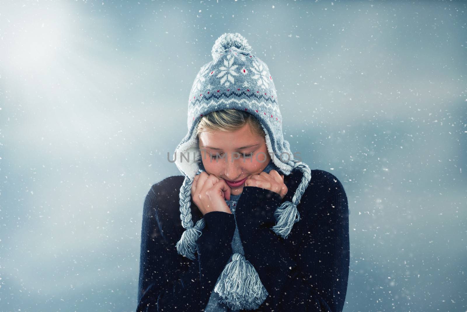 young cute woman freezing in snowstorm