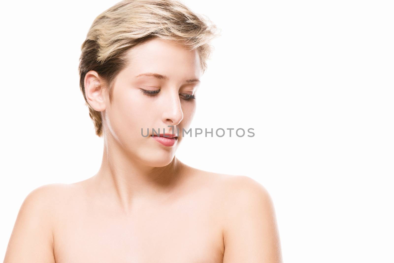 beautiful young woman looking at her shoulder on white background