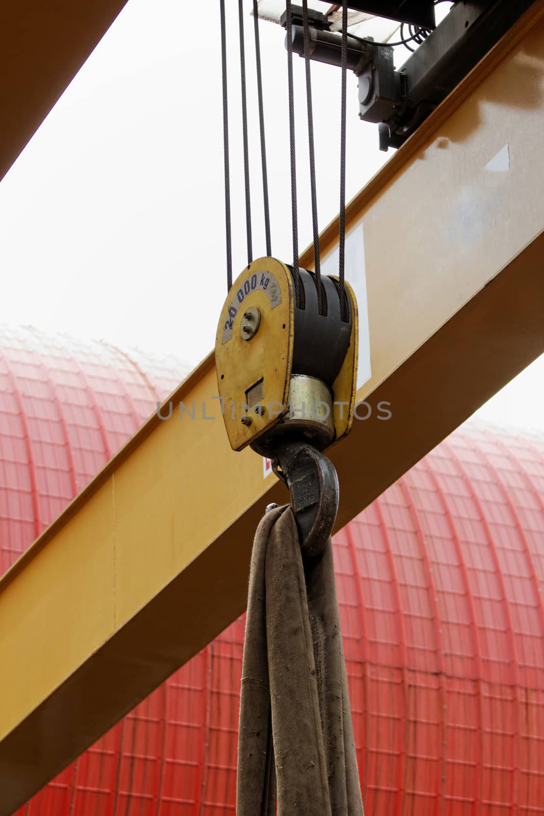 industrial crane hook with wire rope holding the load
