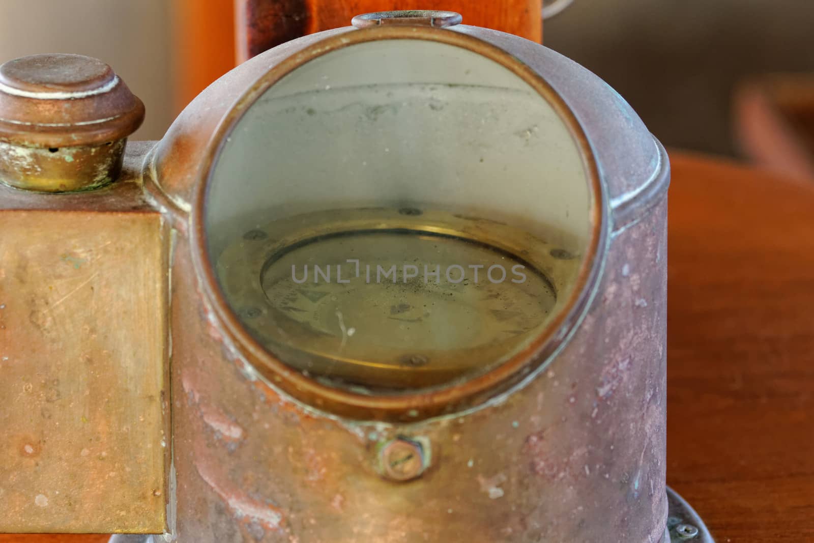Old rusty antique nautical compass (close up)