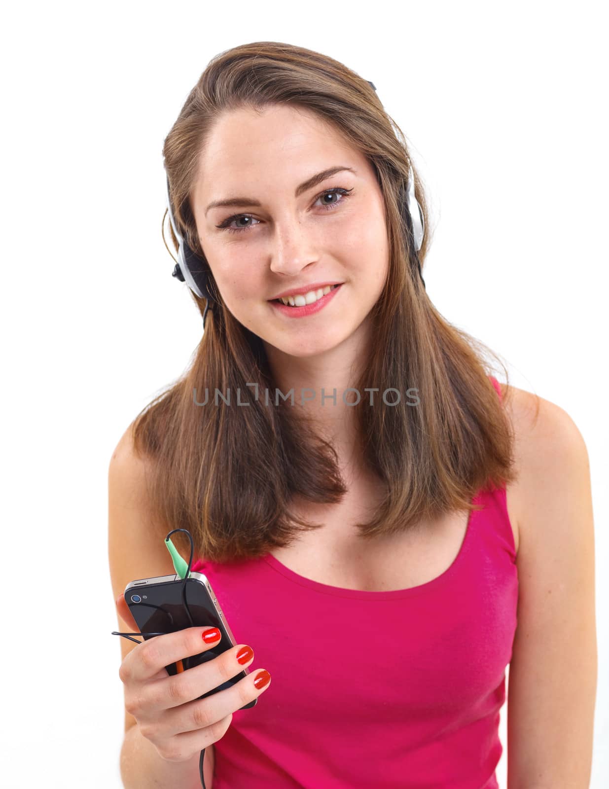 Teenage girl in headphones listen music. Isolated white background