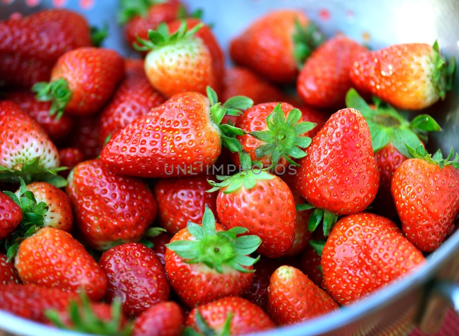 Strawberries in a silver bowl