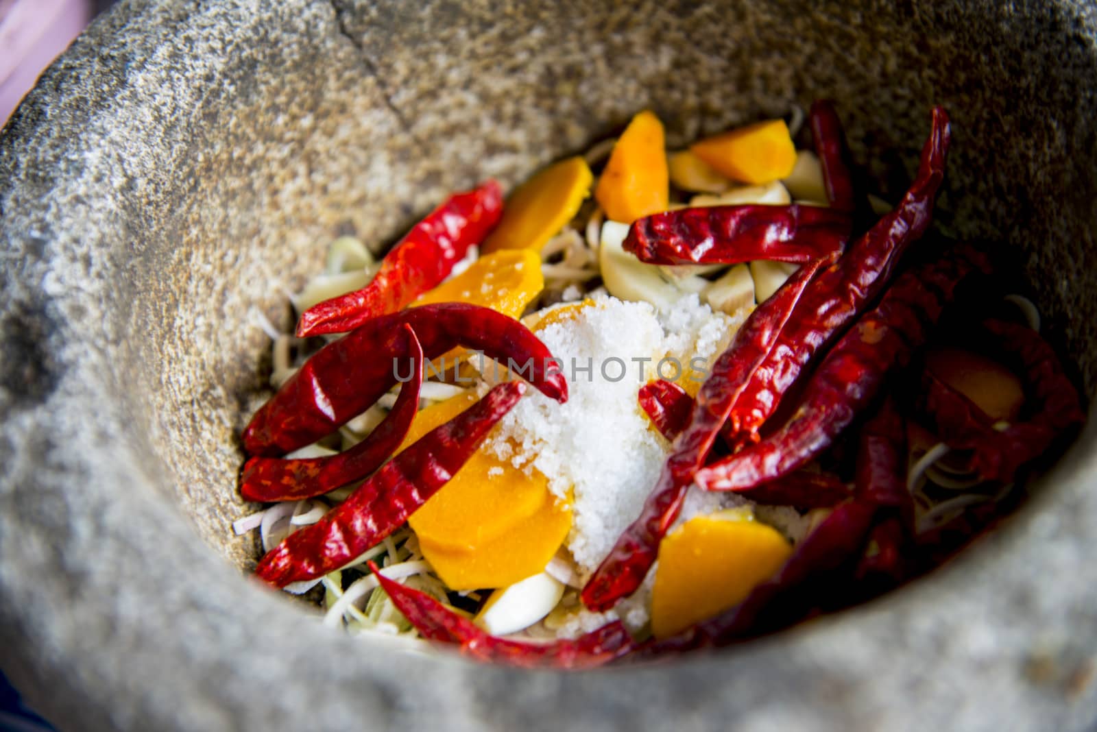 Ingredient of Thai curry are in the mortar1 by gjeerawut