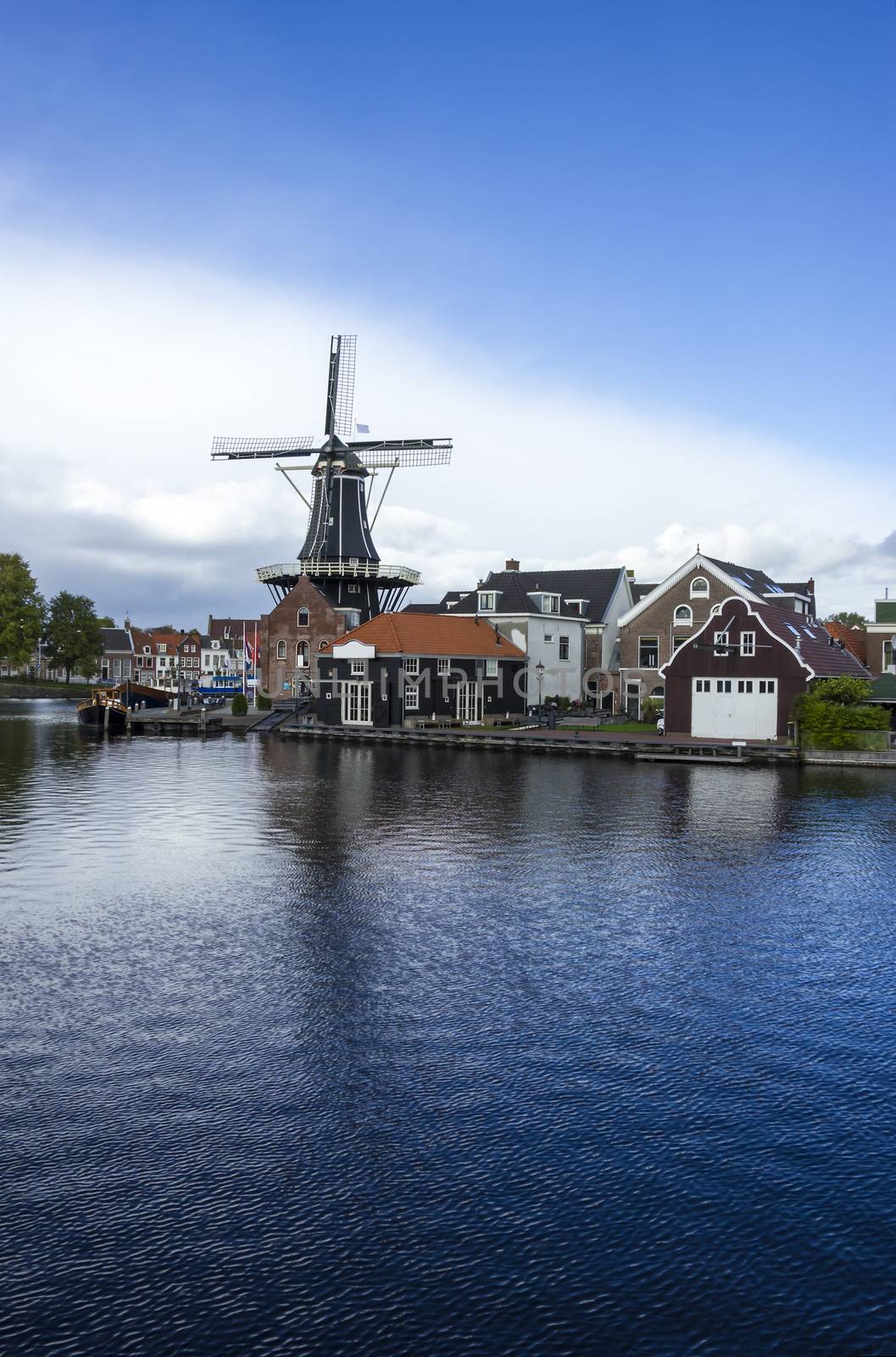 Picturesque landscape with windmill. Haarlem, Holland