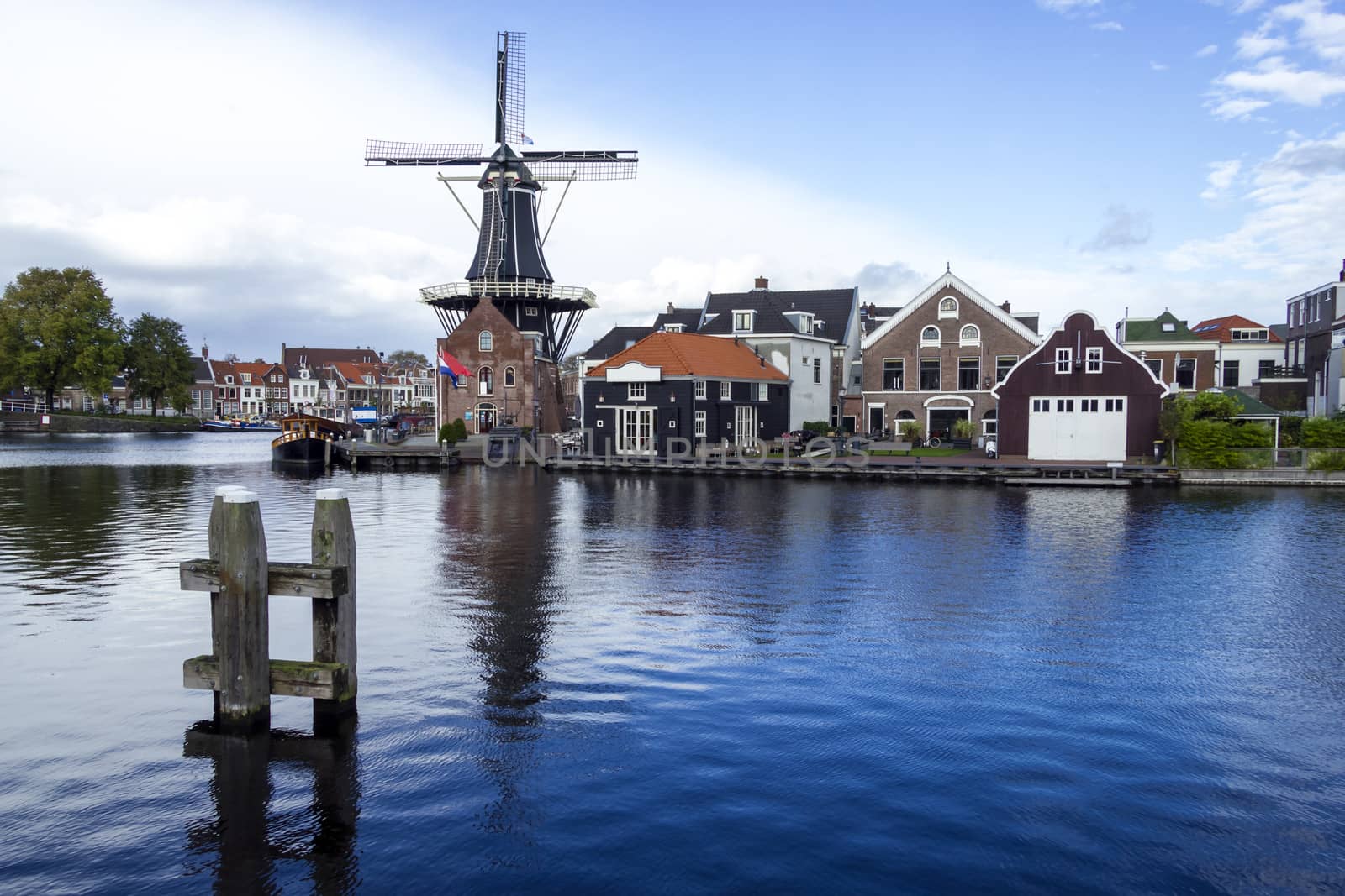 Picturesque landscape with windmill. Haarlem, Holland