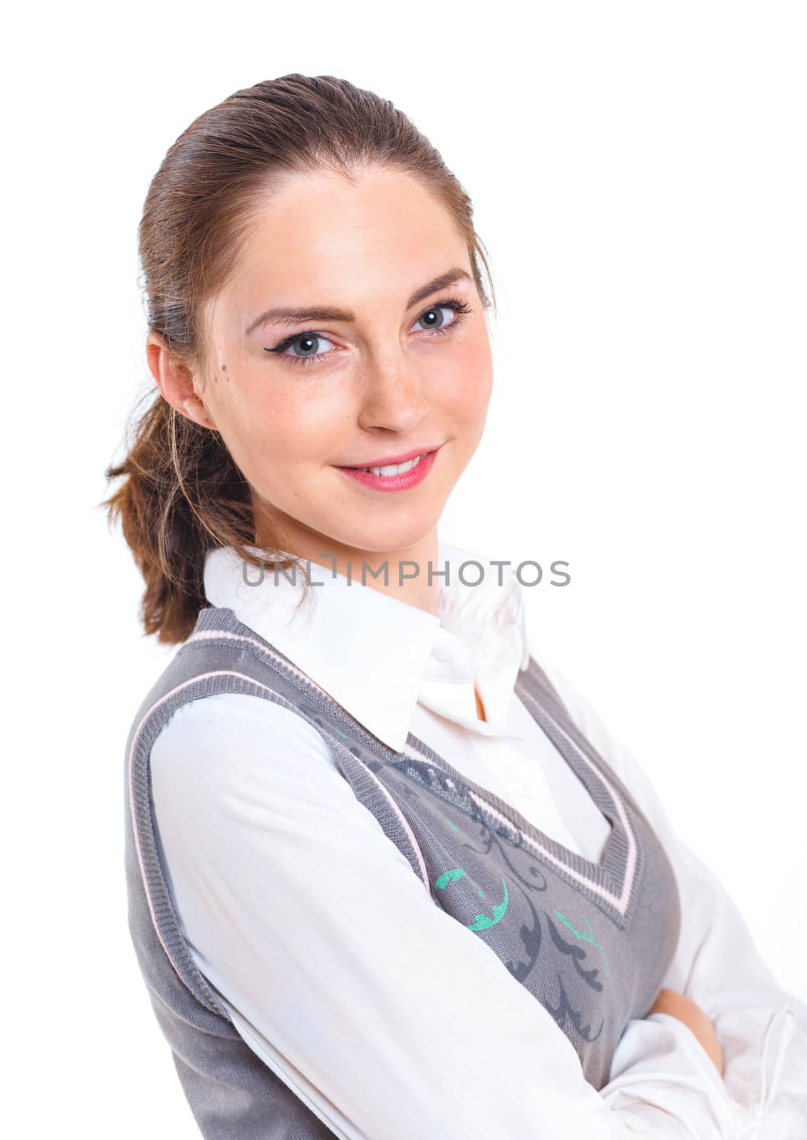 Smiling teenager girl in studio. Isolated white background