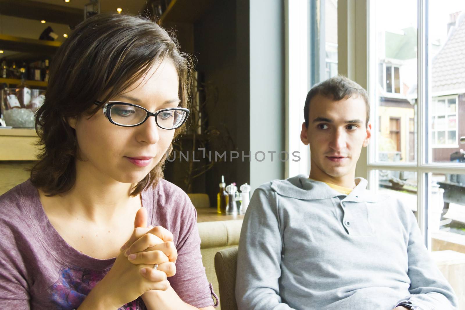 Young man on romantic date with his sweetheart in a cafe