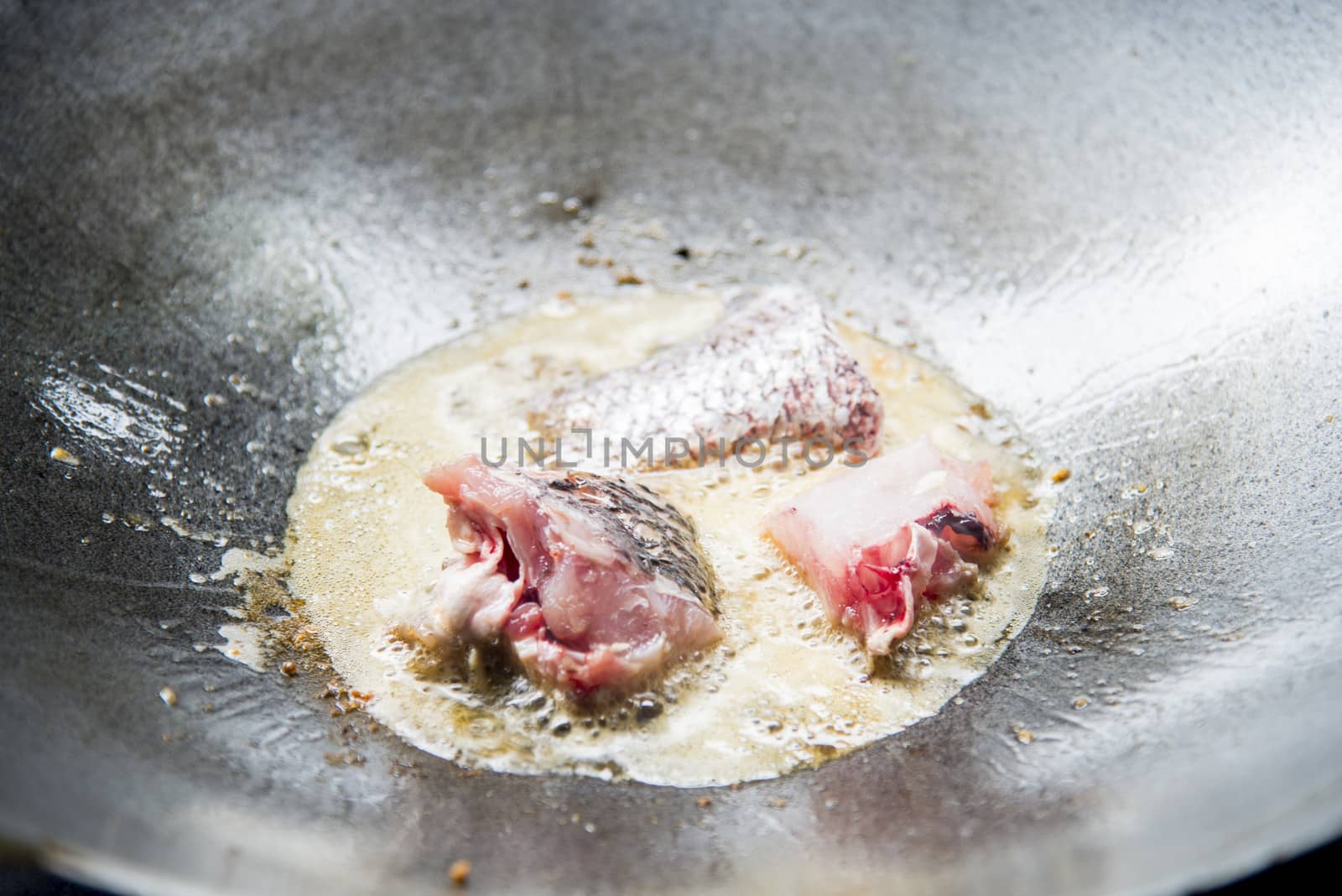 Fried pieces of fish in a pan6