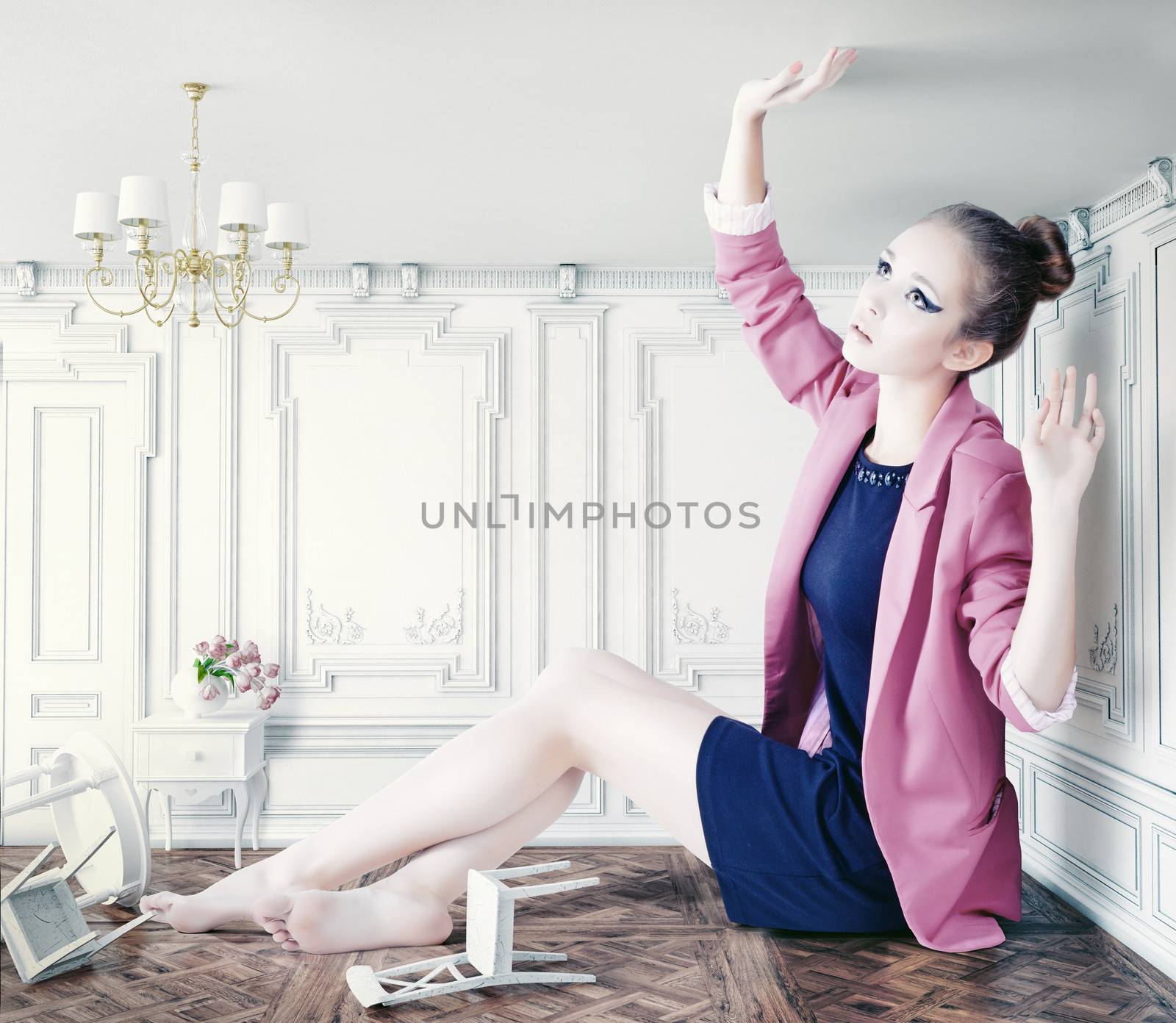 beautiful young girl in little room. creative concept