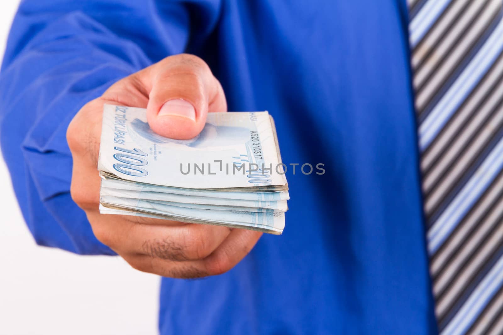 Businessman giving money, isolated on white background.